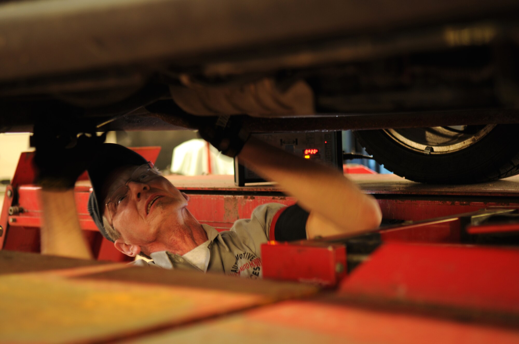 Rod Romman, 86th Services Auto Hobby Shop Annex automotive technician, performs a four-wheel alignment at the annex March1, 2010, Ramstein Air Base. The annex is one of two auto hobby shops on base that were reorganized to provide better customer service to servicemembers and their families.  (U.S. Air Force photo by Airman 1st Class Scott Saldukas)

