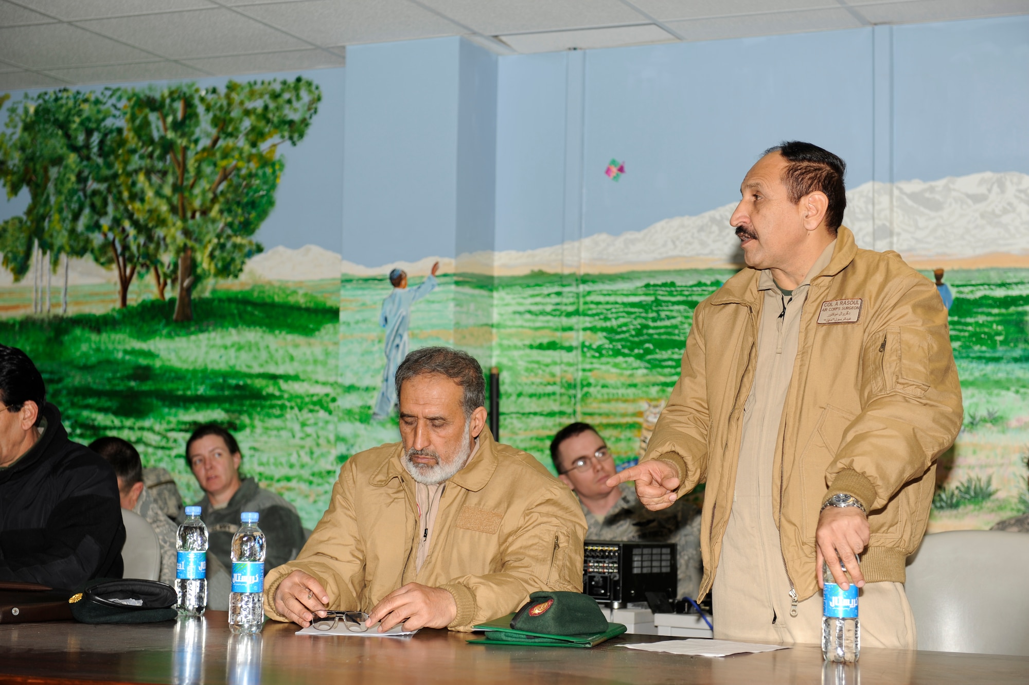 Afghan Col. Abdul Rasoul, surgeon general, Afghan National Army Air Corps, briefs at an ANAAC and coalition forces meeting at the Craig Joint Theater Hospital, Bagram Airfield, Afghanistan, March 6, 2010. During this meeting Afghan and coalition forces discussed the evolution of the medical evacuation mission in Afghanistan. (U.S. Air Force photo by/ Tech. Sgt. Jeromy K. Cross/released)