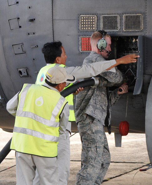 PHNOM PENH, Kingdom of Cambodia -- Airman 1st Class Brandon Swanner, a crew chief with the 353rd Maintenance Squadron, fuels up a MC-130P Combat Shadow here Feb. 22. Airmen from the 353rd Special Operations Group deployed here Feb. 21-24 to support a training exercise between U.S. Army Special Forces and Royal Cambodian Armed Forces National Counter-Terrorism Special Forces. (U.S. Air Force photo by Tech. Sgt. Aaron Cram)