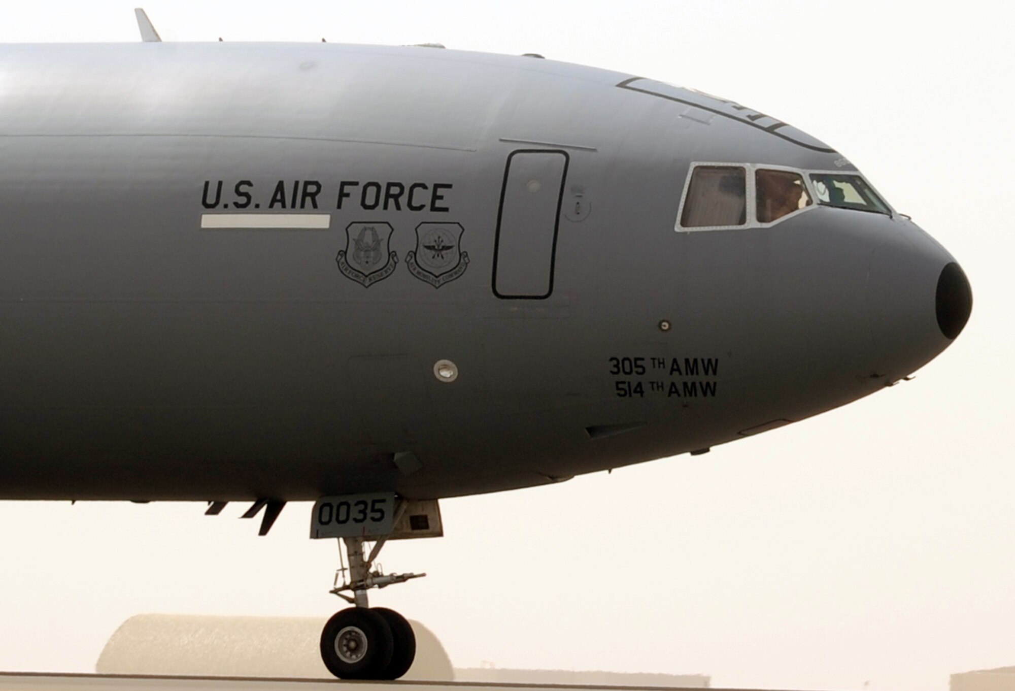 A flight crew drive a KC-10 Extender from the 908th Expeditionary Air Refueling Squadron down the taxiway en route to a mission during operations on the flightline for the 380th Air Expeditionary Wing at a non-disclosed base in Southwest Asia on March 1, 2010. The 380th AEW supports operations Iraqi Freedom and Enduring Freedom and the Combined Joint Task Force-Horn of Africa. (U.S. Air Force Photo/Master Sgt. Scott T. Sturkol/Released)