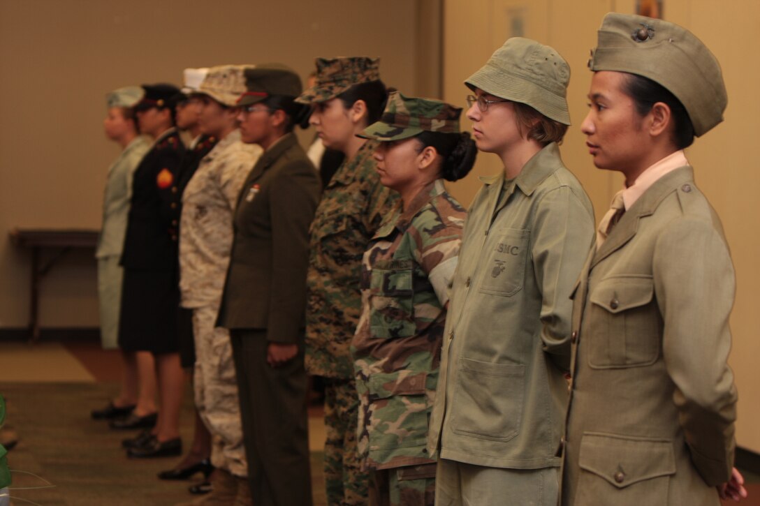 Marines display the different uniforms women have worn since World War I during the Women’s History Month fashion show in building 1707 March 12 from 10:30-11:30 a.m. As each uniform was presented, the narrator related the history of the uniform and the significant contributions women have made throughout the history of the Corps.