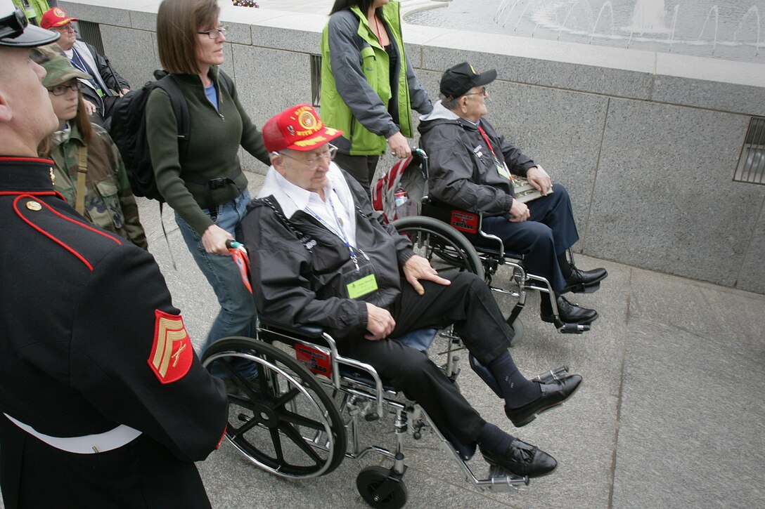World War II veterans arrive at the World War II Memorial in Washington, D.C., for a ceremony honoring their service in the Pacific theater March 11. The event was sponsored by Home Box Office and Honor Flight Network and coincided with the release of “The Pacific,” a ten-part miniseries following three Marines as they make their way through the Pacific theater of World War II. Honor Flight Network is a non-profit organization that offers trips to the capital for military veterans.