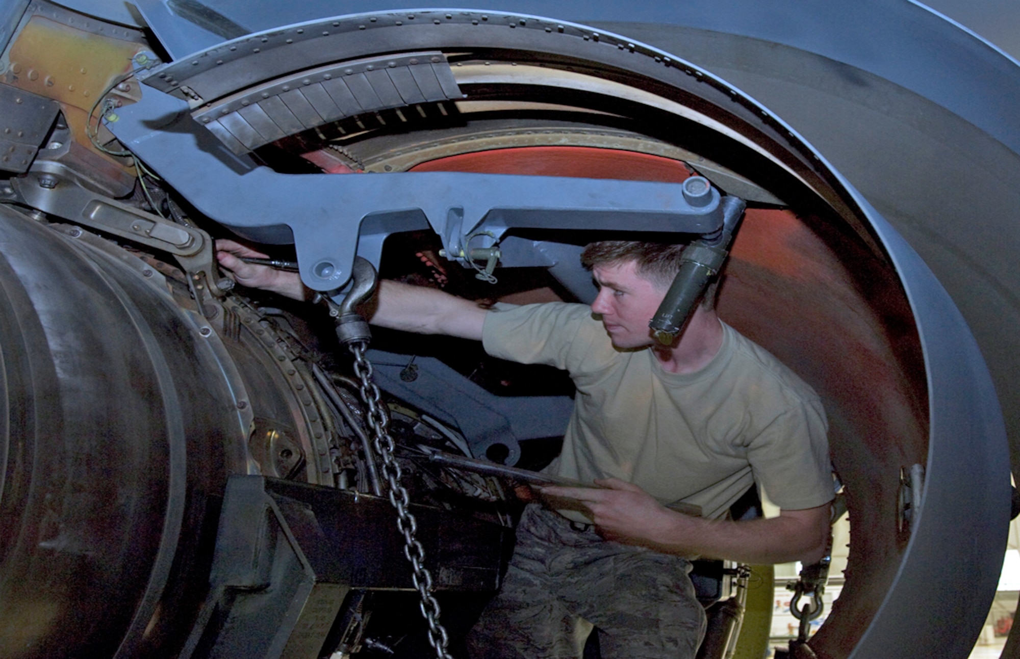 Airman 1st Class Richard Baker loosens bolts mounting a KC-135R Stratotanker F108-100 engine March 3, 2010, that will be sent to Tinker Air Force Base, Okla. Airman Baker is a mechanic assigned to the 22nd Aircraft Maintenance Squadron. (U.S. Air Force photo/Senior Airman Abigail Klein)