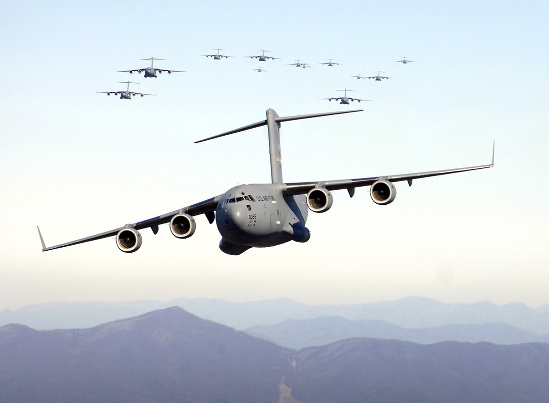 A formation of C-17 Globemaster IIIs fly over the Blue Ridge Mountains in Virginia during low-level tactical training in December 2005. The 445th Airlift Wing at Wright-Patterson Air Force Base, Ohio, will become Air Force Reserve Command's fourth C-17 unit and second unit to be equipped with its own Globemaster III aircraft. (U.S. Air Force photo/Staff Sgt. Jacob Bailey)

