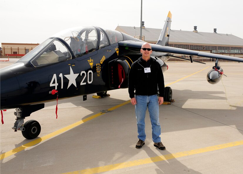 HOLLOMAN AIR FORCE BASE, N.M. -- Mike Peterson with the Classic Jets Aircraft Association shows off his Dornier Alpha Jet March 6, 2010, at the 2010 CJAA annual convention. The CJAA's stay at Holloman consisted of two days of briefings and presentations on the 49th Fighter Wing's mission and activities including a look at the F-22 Raptor by 49th Operations Group personnel. The association started in 1989 and is an organization of pilots who restore, own and operate classic jets. (U.S. Air Force photo by Senior Airman DeAndre Curtiss)