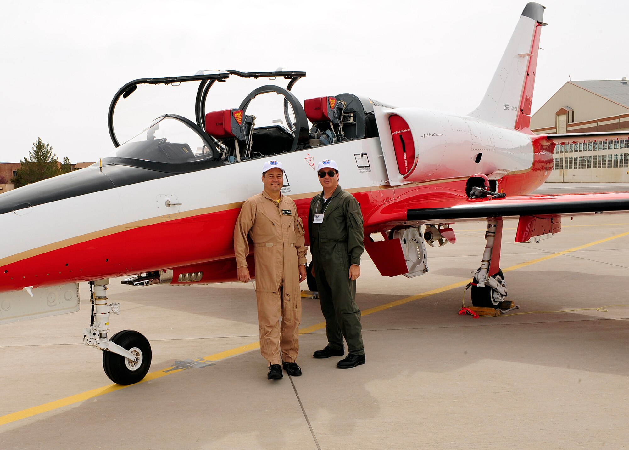 HOLLOMAN AIR FORCE BASE, N.M. -- Arnie Epikimo and Chris Barger with the Classic Jets Aircraft Association stand in front of their Aero L-39 Albatros March 6, 2010, at the 2010 CJAA annual convention. The mission of the Classic Jet Aircraft Association is to assist in the preservation of the right to fly their aircraft with the least amount of regulation and restrictions commensurate with the safe operation of their aircraft. (U.S. Air Force photo by Senior Airman DeAndre Curtiss)