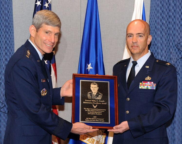 Air Force Chief of Staff Gen. Norton Schwartz presents the Gen. Wilbur L. Creech Maintenance Excellence Award for 2009 to Col. T. Glenn Davis, former A4 director of logistics for Air Force Reserve Command, on March 11, 2010. (U.S. Air Force photo)