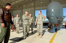 Maj. Gen. Martin Mazick, Vice Commander of Air Force Reserve Command, walks around the RQ-4 with members of the 13th Reconnaissance Squadron at Beale Air Force Base, Calif., home of the remotely piloted aircraft.  The general was briefed on the Global Hawk mission during his visit to the 940th Wing on March 10, 2010.  Accompanying the general on his walk-around are 13 RS members Lt. Col. Dale Bellissimo, RQ-4 pilot, Master Sgt. Charles Mackay, aircraft overhaul supervisor, Tech. Sgt. Thomas Kirk, avionics technician, Chief Master Sgt. Stuart Bisland, superintendent, and Capt. Christopher Cheshire, maintenance officer.
