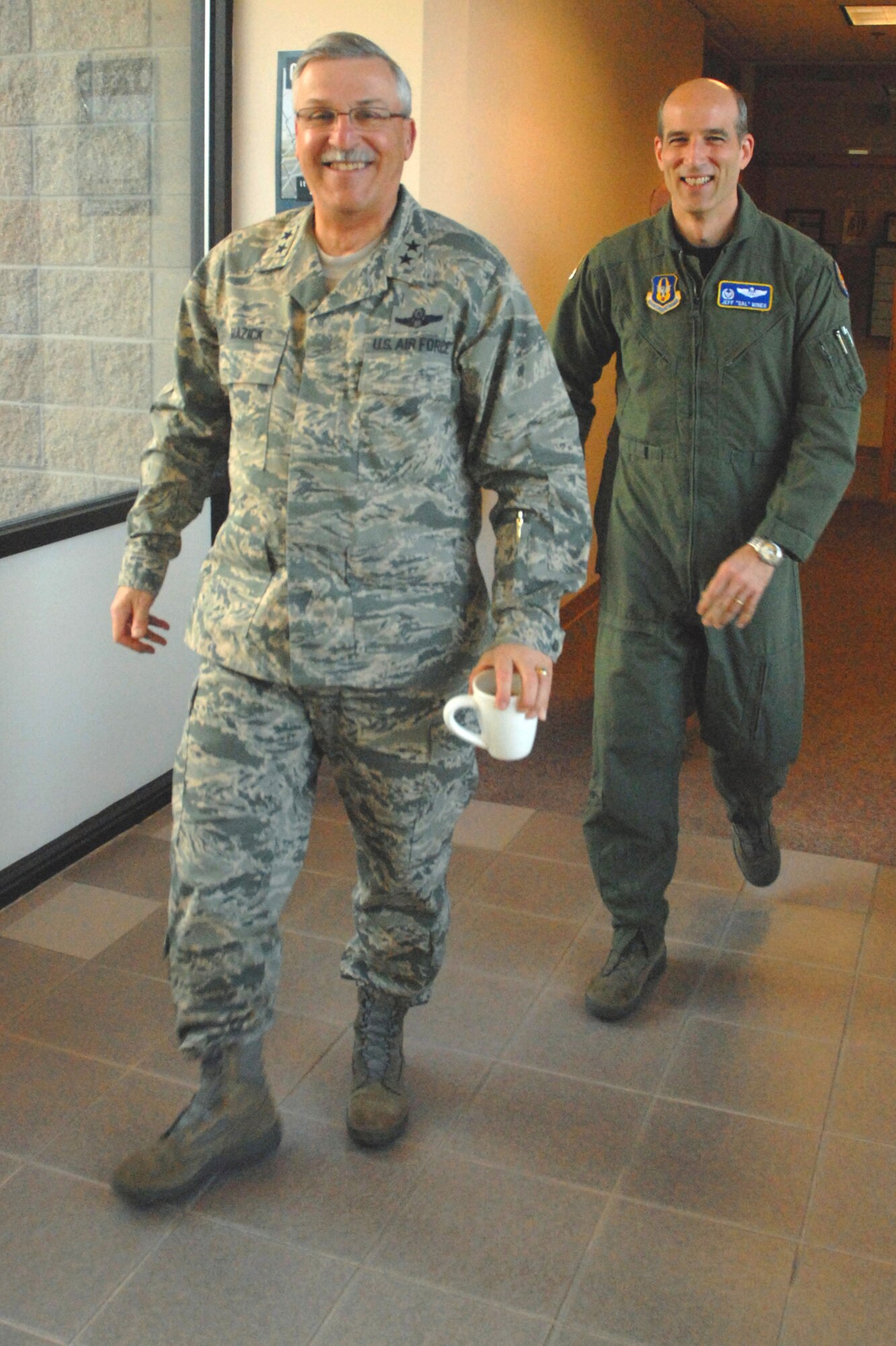 Maj. Gen. Martin Mazick, Vice Commander of Air Force Reserve Command, leaves the office of Colonel Jeffrey Mineo, 940th Wing Commander, on his way to the first briefing of the day.  The general visited the 940th Wing at Beale Air Force Base, Calif., on March 10, 2010, touring the Reserve wing’s operational squadrons.