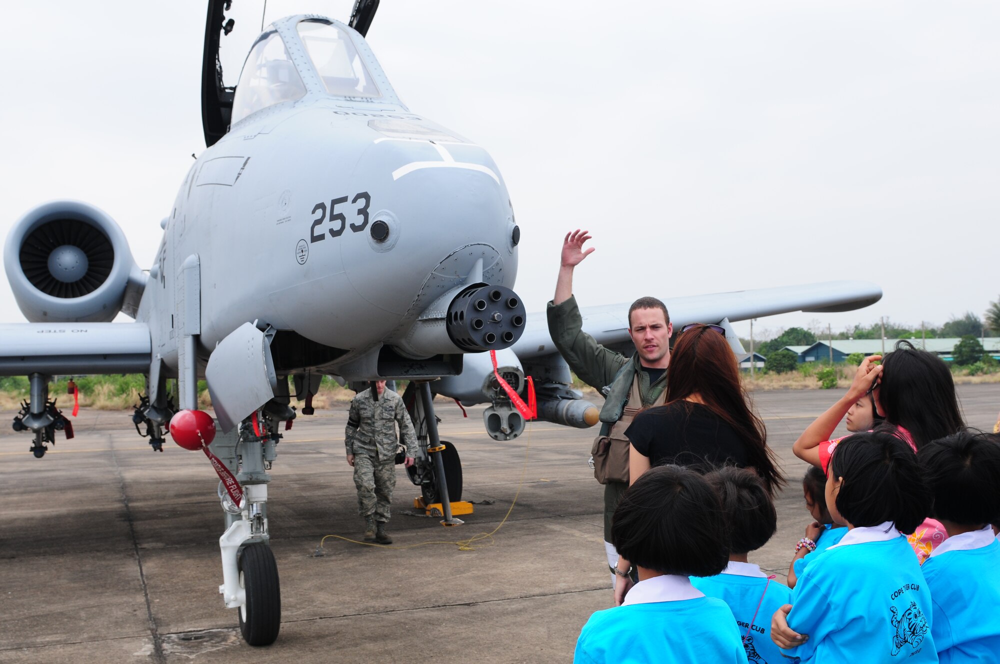 Capt. Joel Bernazzani talks about the A-10 Thunderbolt II during the Cope Tiger 2010 open house held for more than 50 Thai students March 10 at Udon Thani Royal Thai Air Force Base, Thailand.  Captain Bernazzani is a pilot from the 25th Fighter Squadron at Osan Air Base, South Korea. (U.S. Air Force photo/Capt. Genieve David)