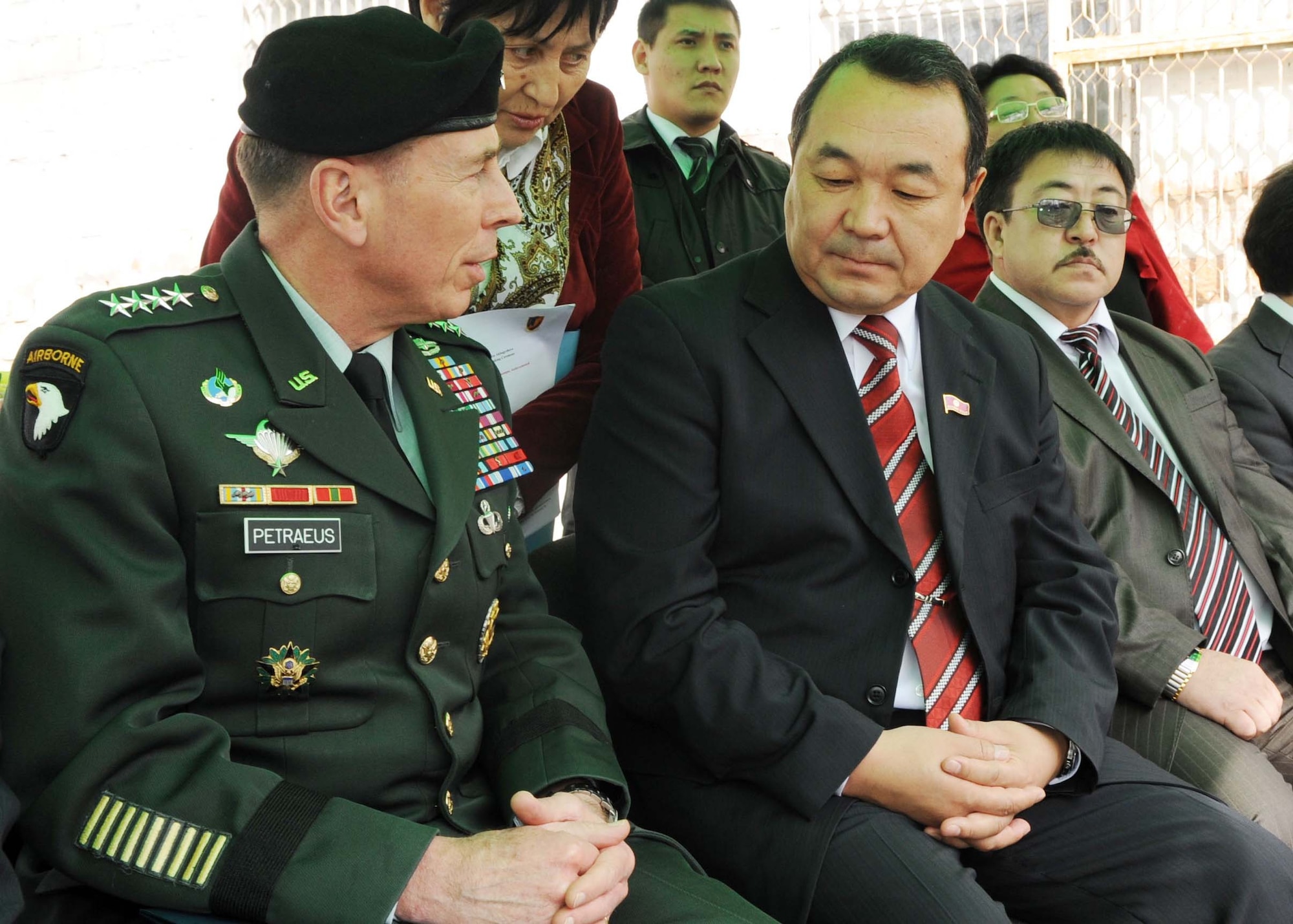 U.S. Army Gen. David Petraeus, Commander, U.S. Central Command, speaks with Mr. Kubanychbek Isabekov, Vice Speaker of the Kyrgyz Parliament, before the ground breaking ceremony for the Women's Center in Bishkek, Kyrgyzstan, March 11, 2010. (U.S. Air Force photo/Senior Airman Nichelle Anderson 