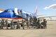 Airmen from the 95th Security Forces Squadron board a chartered plane March 10th.  About 40 Airmen from 95th SFS are deploying to Bagram Air Base, Afghanistan for six months. (Air Force photo/Kenji Thuloweit)