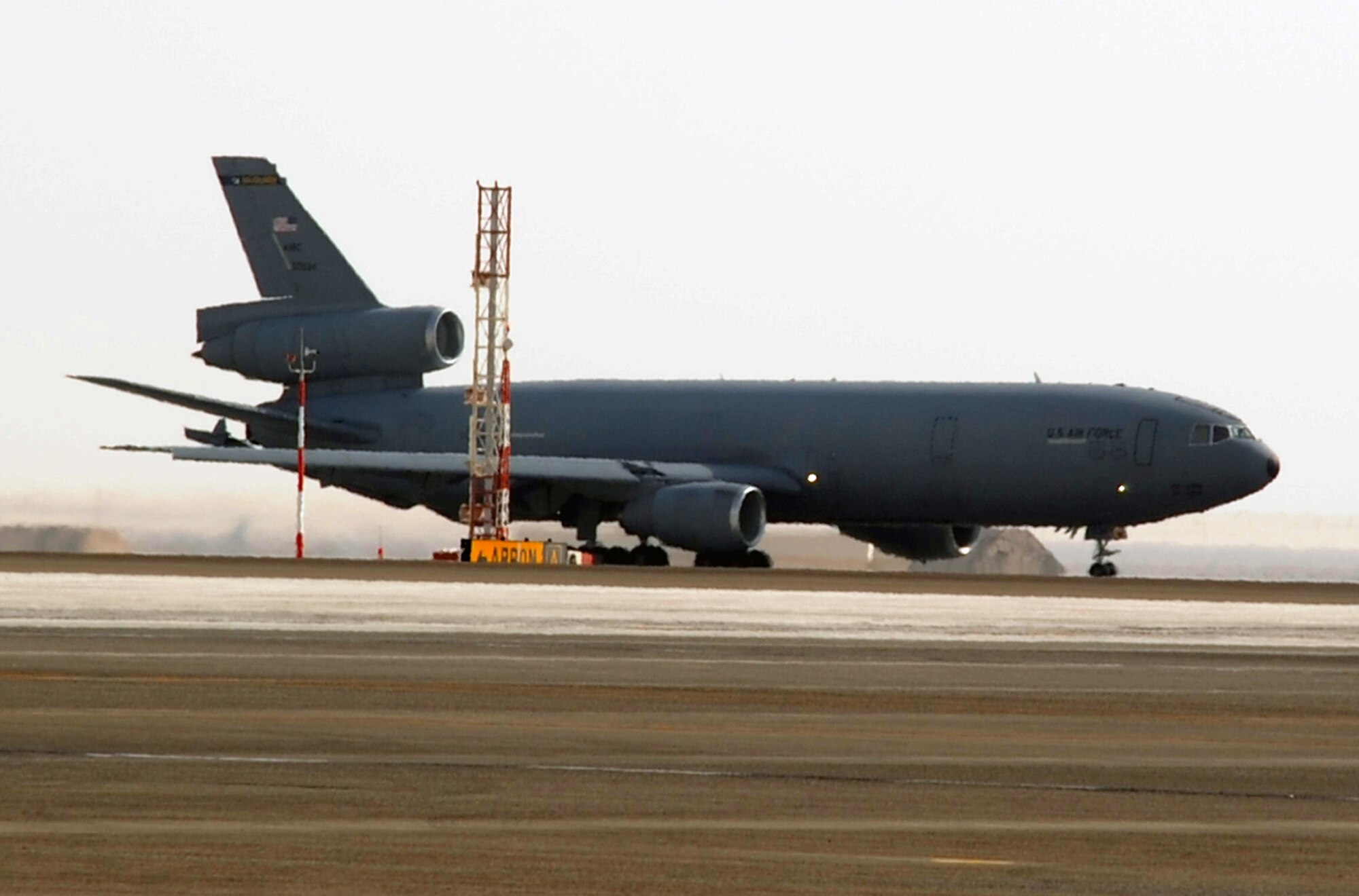 A KC-10 Extender from the 908th Expeditionary Air Refueling Squadron takes off for a combat missions operations at a non-disclosed base in Southwest Asia on March 8, 2010. The 908th EARS, as part of the 380th Air Expeditionary Wing, supports operations Iraqi Freedom and Enduring Freedom and the Combined Joint Task Force-Horn of Africa.  The E-3 Sentrys and their associated maintenance Airmen are deployed from Tinker Air Force Base, Okla. (U.S. Air Force Photo/Master Sgt. Scott T. Sturkol/Released)