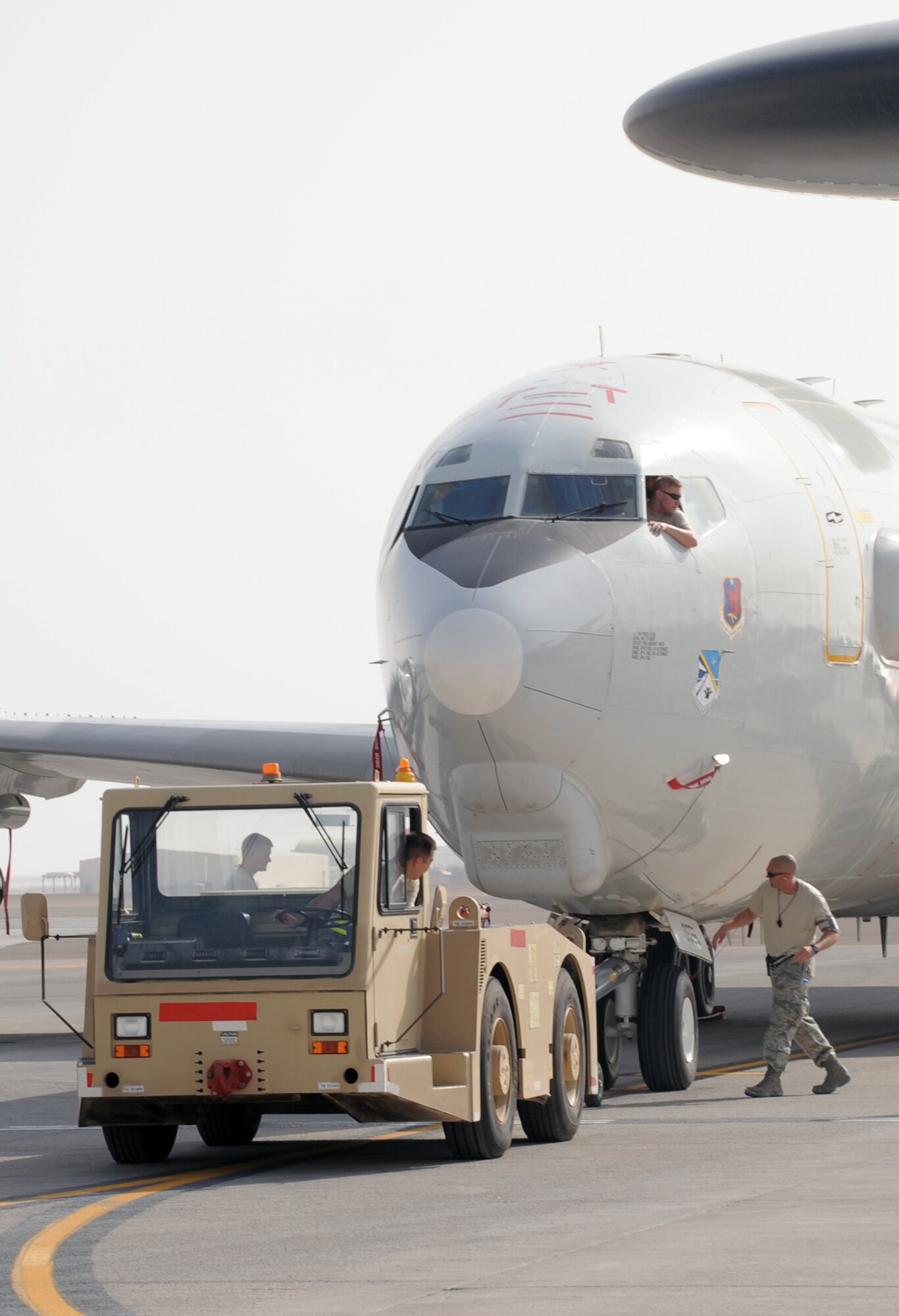 Maintenance Airmen from the 380th Expeditionary Aircraft Maintenance Squadron's Sentry aircraft maintenance unit work on an E-3 Sentry Airborne Warning and Control System aircraft during flightline operations at a non-disclosed base in Southwest Asia on March 8, 2010. The 380th EAMXS, as part of the 380th Air Expeditionary Wing, supports operations Iraqi Freedom and Enduring Freedom and the Combined Joint Task Force-Horn of Africa.  The E-3 Sentrys and their associated maintenance Airmen are deployed from Tinker Air Force Base, Okla. (U.S. Air Force Photo/Master Sgt. Scott T. Sturkol/Released)