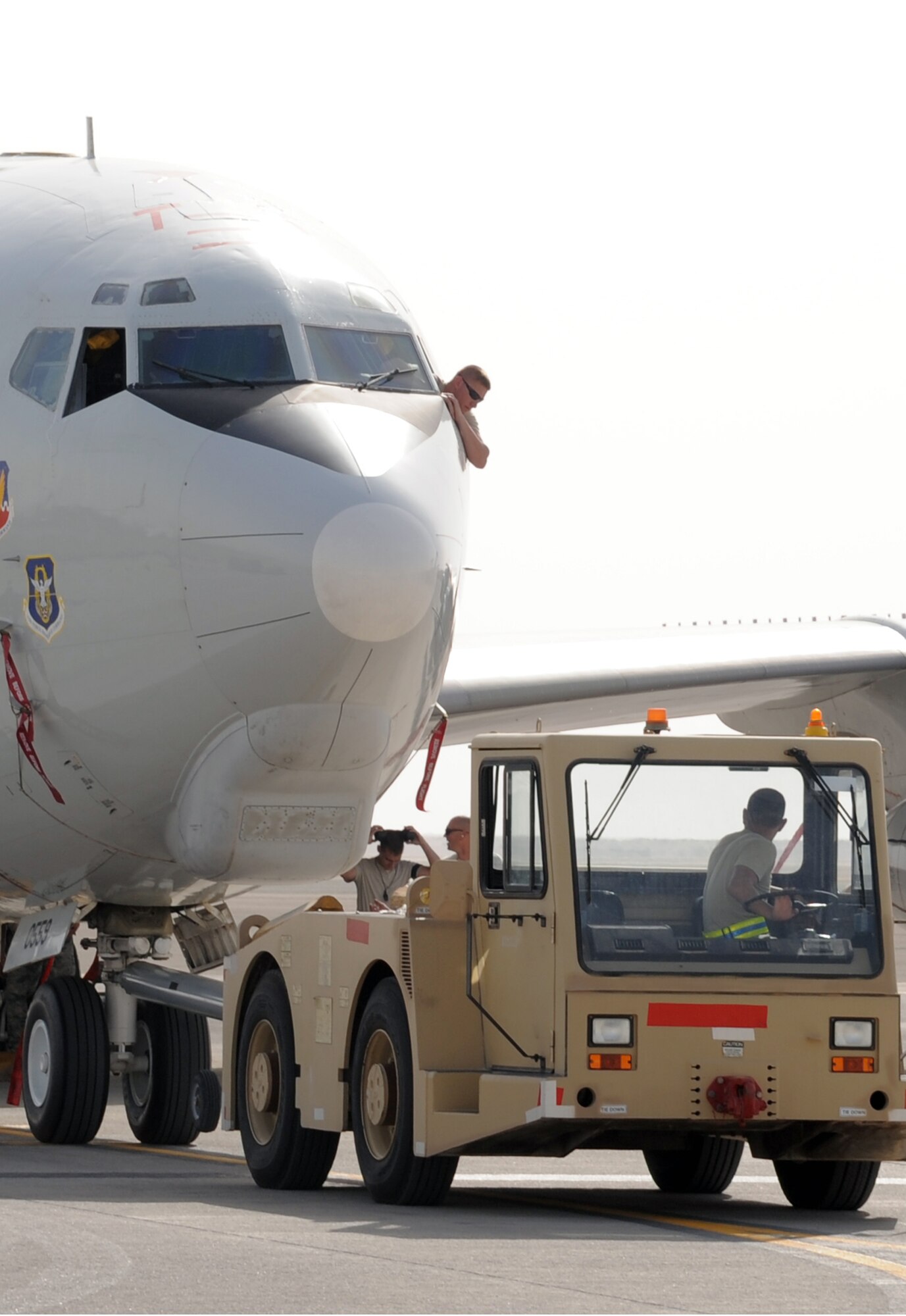Maintenance Airmen from the 380th Expeditionary Aircraft Maintenance Squadron's Sentry aircraft maintenance unit work on an E-3 Sentry Airborne Warning and Control System aircraft during flightline operations at a non-disclosed base in Southwest Asia on March 8, 2010. The 380th EAMXS, as part of the 380th Air Expeditionary Wing, supports operations Iraqi Freedom and Enduring Freedom and the Combined Joint Task Force-Horn of Africa.  The E-3 Sentrys and their associated maintenance Airmen are deployed from Tinker Air Force Base, Okla. (U.S. Air Force Photo/Master Sgt. Scott T. Sturkol/Released)