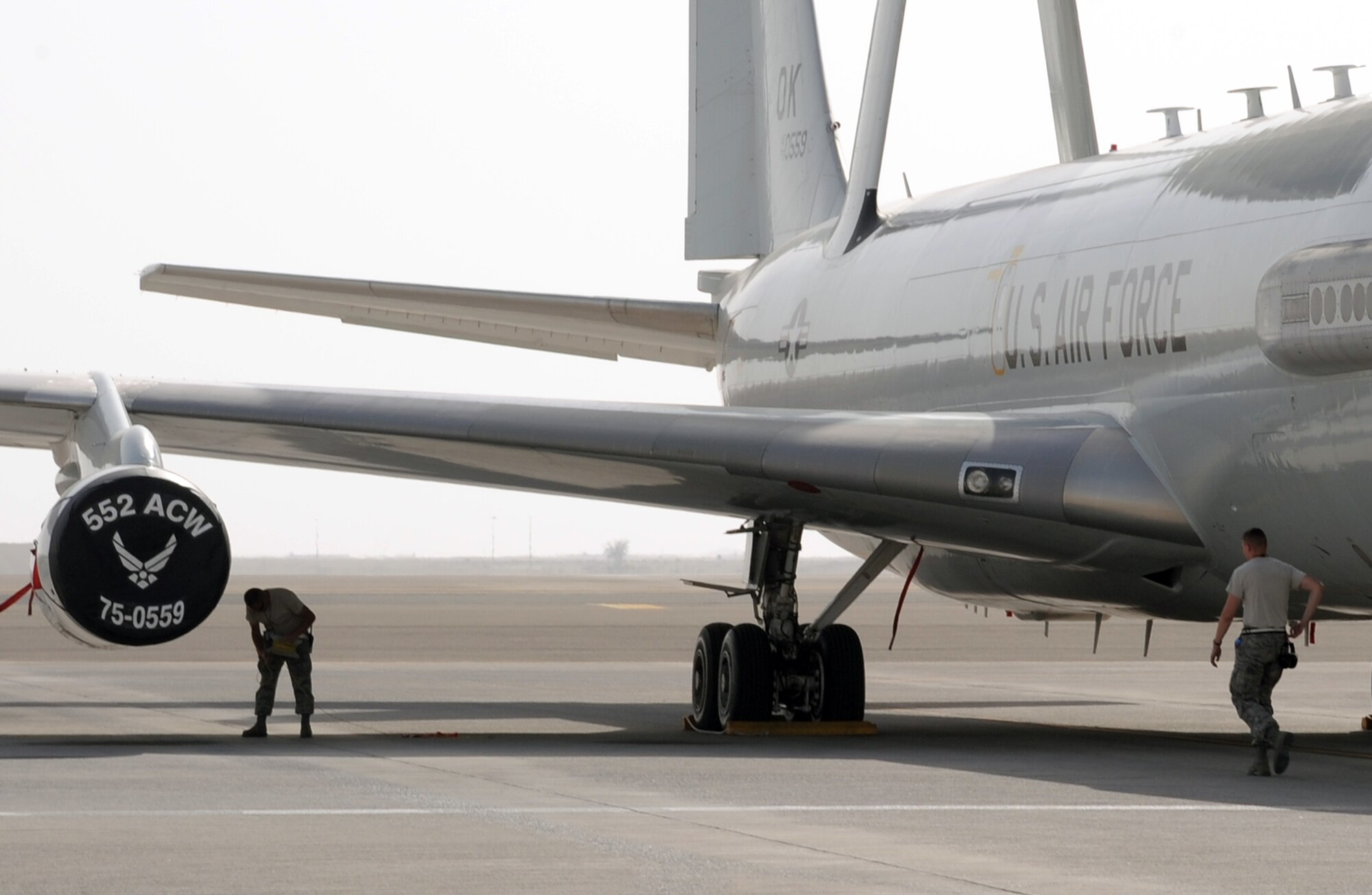 Maintenance Airmen from the 380th Expeditionary Aircraft Maintenance Squadron's Sentry aircraft maintenance unit work on an E-3 Sentry Airborne Warning and Control System aircraft during flightline operations at a non-disclosed base in Southwest Asia on March 8, 2010. The 380th EAMXS, as part of the 380th Air Expeditionary Wing, supports operations Iraqi Freedom and Enduring Freedom and the Combined Joint Task Force-Horn of Africa.  The E-3 Sentrys and their associated maintenance Airmen are deployed from Tinker Air Force Base, Okla. (U.S. Air Force Photo/Master Sgt. Scott T. Sturkol/Released)