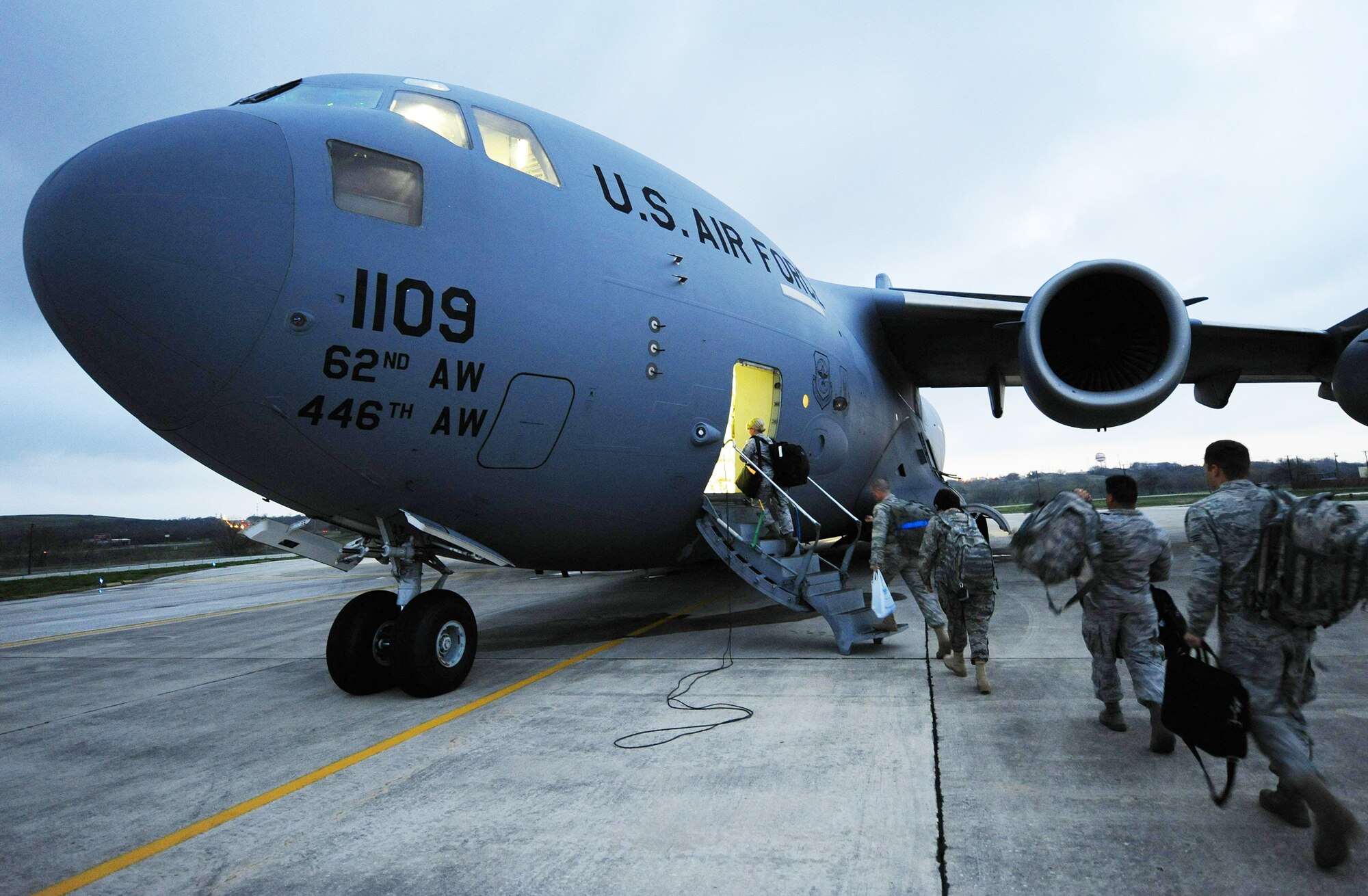 Airmen from an Air Force Expeditionary Medical Support team depart for a humanitarian mission to Angol, Chile, March 8, 2010, from Lackland Air Force Base. The Airmen will set up an expeditionary hospital in Angol after their local hospital was deemed unstable in the 8.8 magnitude earthquake Feb. 27. Air Force medics will work alongside Chilean medics to provide medical support for more than 110,000 in the region. (U.S. Air Force photo/Senior Airman Tiffany Trojca)