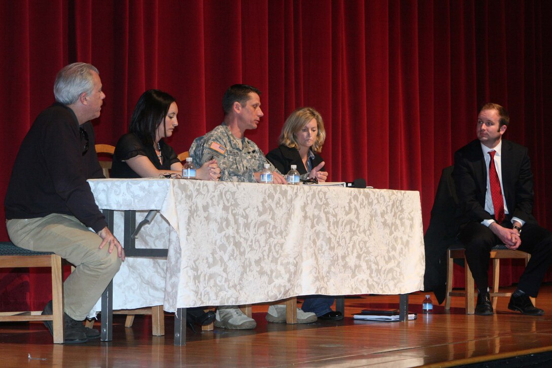 Bryan Doerries, translator of the play "Ajax" and "Philoctetes," Kim Ruocco, a military wife, Army Master Sgt. Creed McCaslin, the senior enlisted with the Defense Center of Excellence for Physiological Health and Traumatic Brain Injury, Shannon Duncan, another military wife, and Robert Lloyd, a counselor with Marine Corps Community Services here, speak about their experiences with post traumatic stress at the Bob Hope Theater here March 12.
