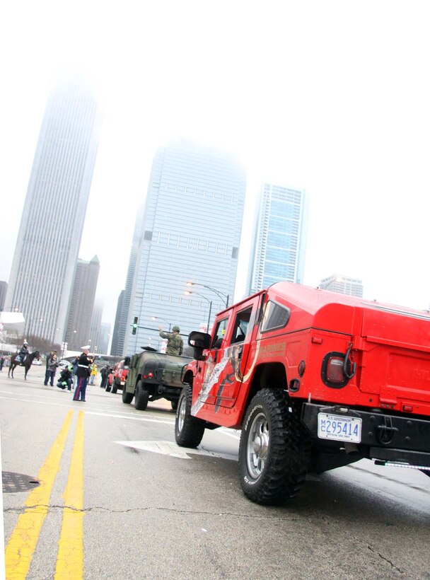 CHICAGO – Marine Corps Humvees line the streets of Downtown Chicago during the 2010 Chicago Saint Patrick’s Day Parade March 13. Marines were thanked and cheered on by more than 20,000 spectators at throughout the march.  (U.S. Marine Corps photo by Sgt. George J. Papastrat) (Released)