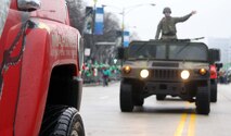 CHICAGO – Marine Humvees, both tactical and commercial, participated in the 2010 Saint Patrick’s Day Parade in downtown Chicago March 13. The Marines rolled through the streets early in the morning as the morning fog lifted off Lake Michigan and were welcomed by thousands of spectators. (U.S. Marine Corps photo by Sgt. George J. Papastrat) (Released)