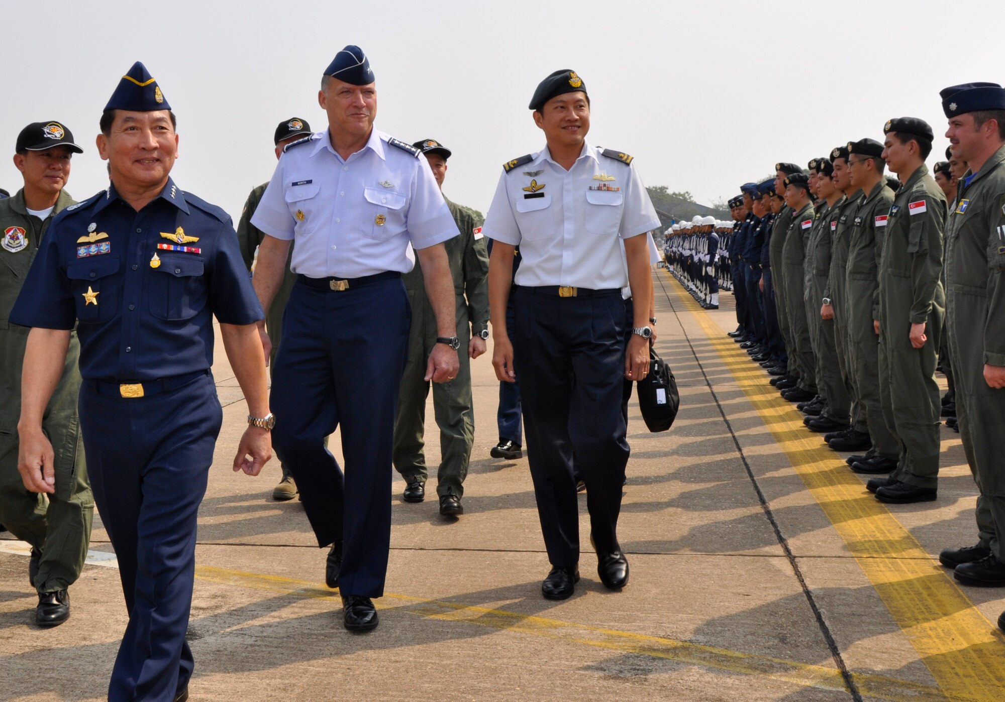Gen. Gary North, Pacific Air Forces commander, walks with Air Chief Marshal  Itthaporn Subhawong, Royal Thai Air Force commander in chief (left) and Brig. 
Gen. Ng Chee Meng, Republic of Singapore Air Force chief of air force (right), in front of a formation of U.S., Singaporean and Thai military personnel on the last day of the Cope Tiger 2010 exercise at Korat Royal Thai Air Force Base, Thailand, March 12. Cope Tiger is an annual multilateral exercise that enhances combined readiness and interoperability, and demonstrates U.S. commitment to the Asia-Pacific region.  (U.S. Air Force photo/Capt. Christy Stravolo)