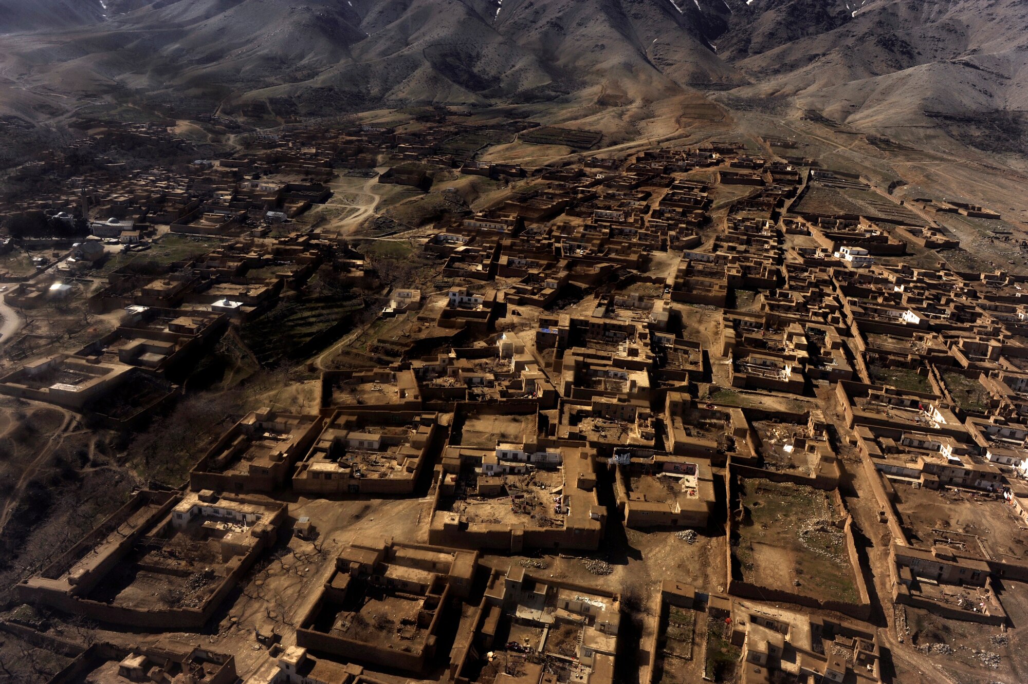 An aerial view from a UH-60 Blackhawk helicopter during a training flight with Afghan National Army Air Corps crew chiefs, March 1, 2010, over Parwan Province, Afghanistan. (U.S. Air Force photo/Staff Sgt. Manuel J. Martinez/released)
