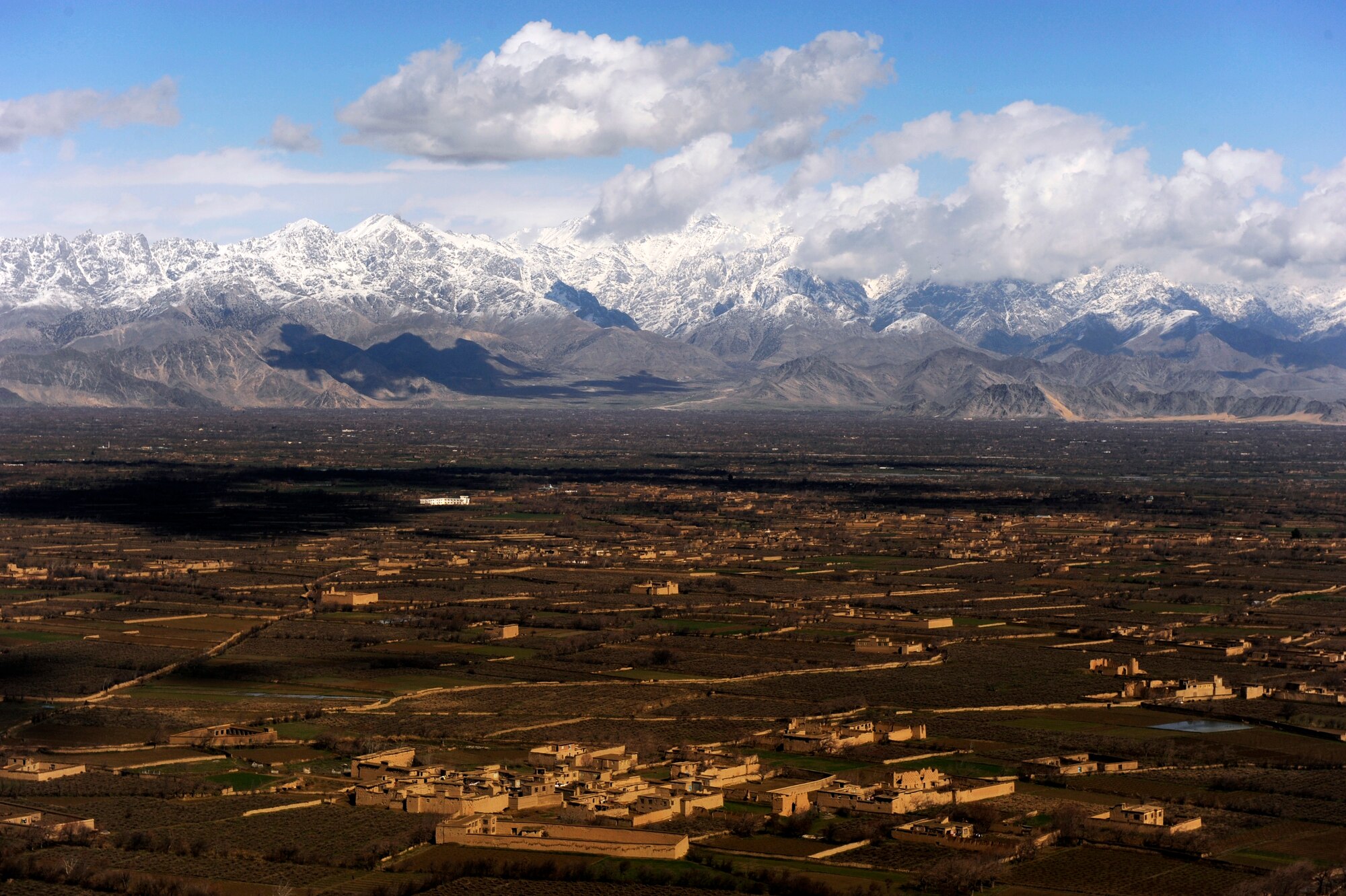 An aerial view from a UH-60 Blackhawk helicopter during a training flight with Afghan National Army Air Corps crew chiefs, March 1, 2010, over Parwan Province, Afghanistan. (U.S. Air Force photo/Staff Sgt. Manuel J. Martinez/released)