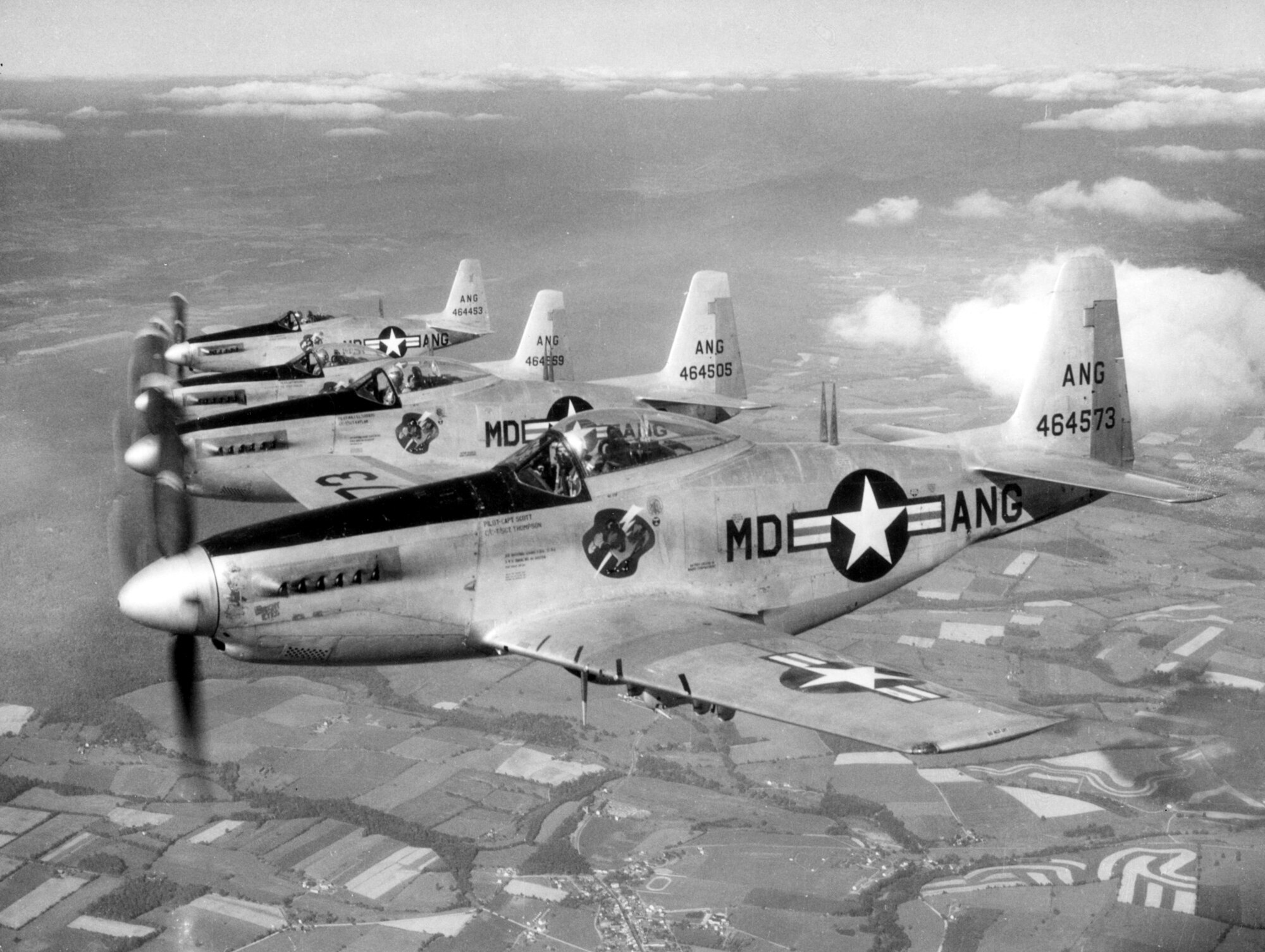 The Maryland Air National Guard's aerial demonstration team, the Guardian Angels, fly their F-51H fighters in close formation. Maryland had an aerial demonstration team from 1952 to 1953. (Released)