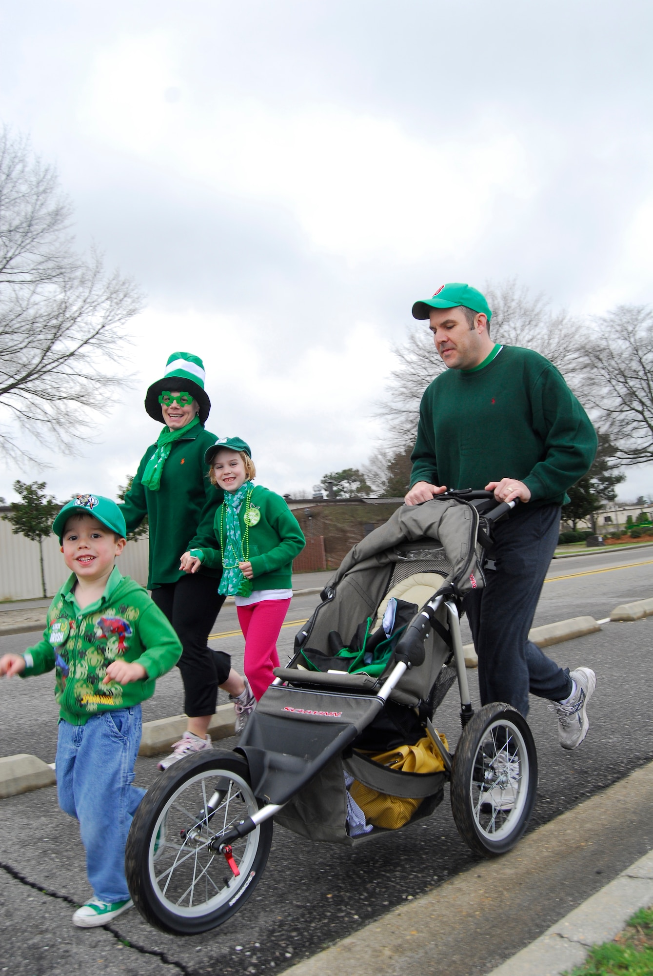 Pope Airmen and their families participated in the 43rd Force Support Squadron's Shamrock and Run at the Fitness Center March 13. Participants ran a two-mile loop along the flightline. (U.S. Air Force photo by 2nd Lt. Cammie Quinn)