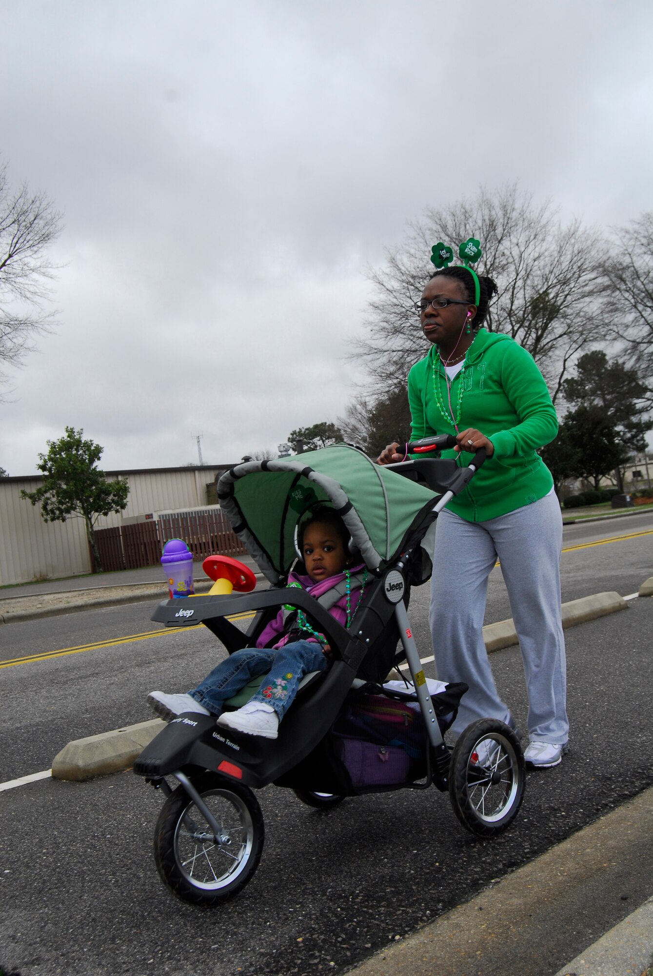 Pope Airmen and their families participated in the 43rd Force Support Squadron's Shamrock and Run at the Fitness Center March 13. Participants ran a two-mile loop along the flightline. (U.S. Air Force photo by 2nd Lt. Cammie Quinn)