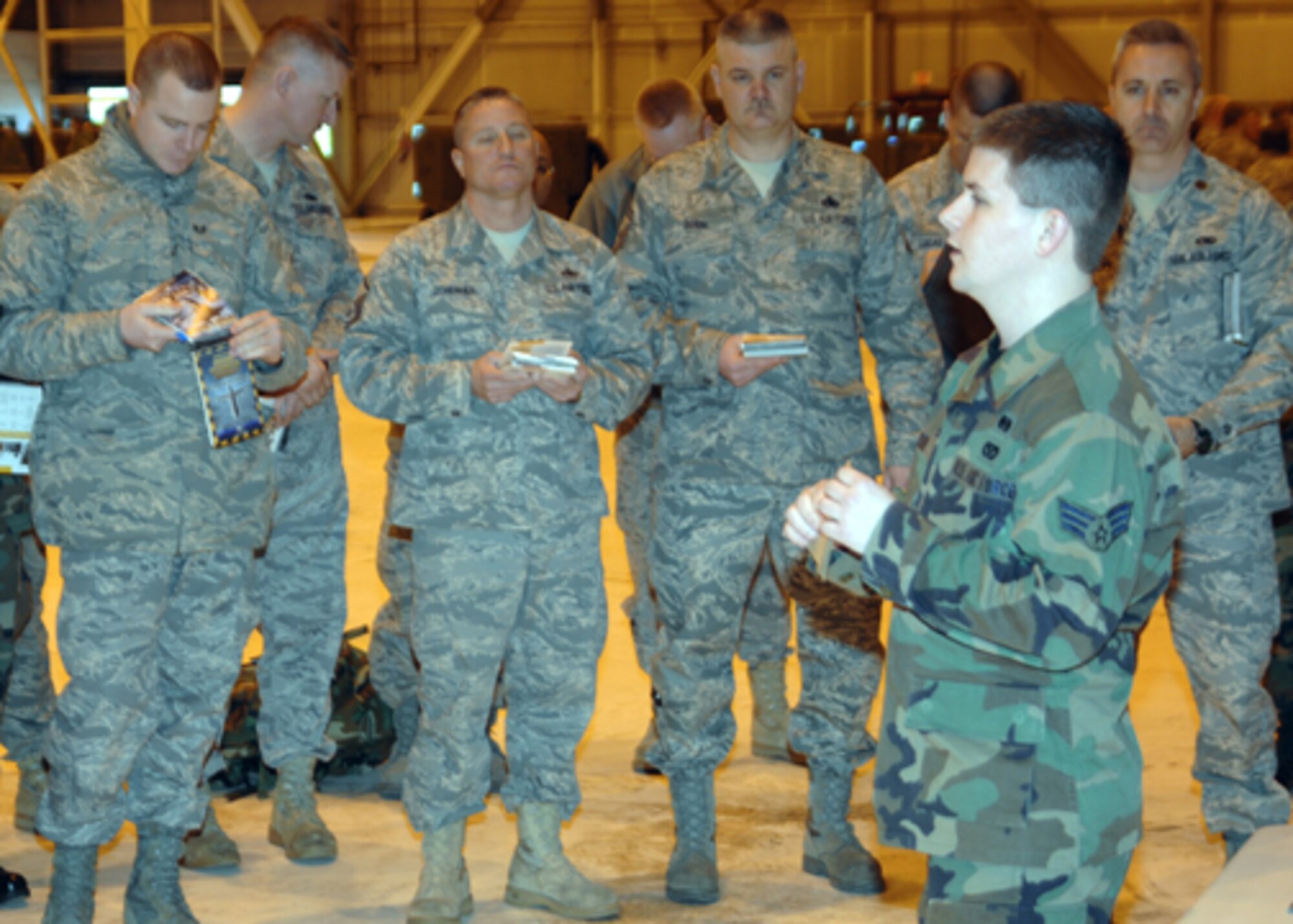 GRISSOM AIR RESERVE BASE, Ind. --  The Abiilty to Survive and Operate refresher was designed to help Airmen brush up on chemical decontamination procedures. Senior Airman Joesph Smith, 434th Civil Engineer Squadron emergency management apprentice, gives instructions as reservist follow along in their Airman's Manual. (U.S. Air Force photo/Senior Airman Carl Berry)