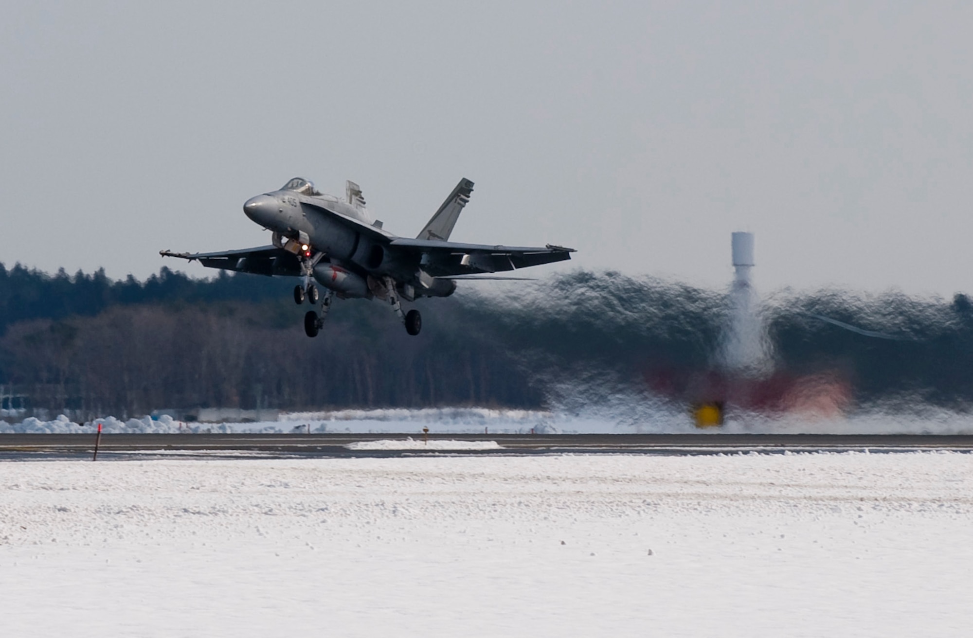 MISAWA AIR BASE, Japan -- An F/A-18 Hornet from the Vertical Fighter Attack Squadron 94 takes off on a training exercise March 12. VFA 94 flew approximately 85 sorties during their 10-day visit to Misawa Air Base. (U.S. Air Force photo/Staff Sgt. Samuel Morse)