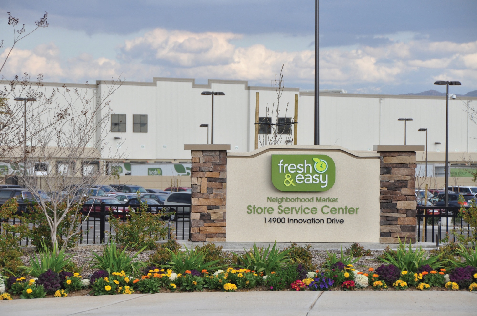 Fresh and Easy built a main distribution center with a $13 million solar roof on former March Air Force Base property. The chain also uses hybrid refrigeration trucks which can be plugged in while they’re at the center, minimizing CO2 emissions and noise. (U.S. Air Force photo by Susan Worlbarst)