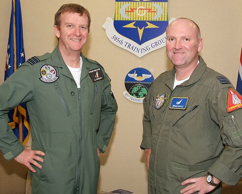 HURLBURT FIELD, Fla. -- Royal Air Force Wing Commanders Allan Goodison and Brian Boyle take a break recently at the 505th Training Group office. Wing Commander Goodison replaces Wing Commander Boyle as 505th TRG deputy commander of development. (U.S. Air Force photo/Noel Getlin)