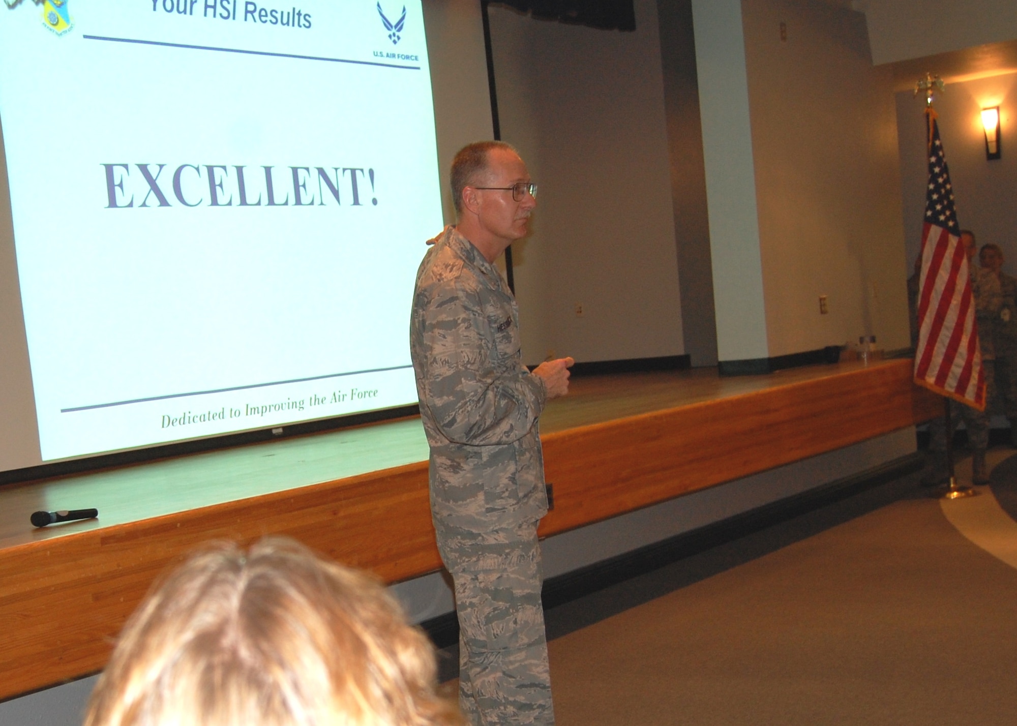 Col. Roger Hesselbrock, Air Force Inspection Agency Health Service Inspection team chief, announces the “Excellent” rating the nine-member team gave the 81st Medical Group during their March 12 official out brief. (Photo by Steve Pivnick)