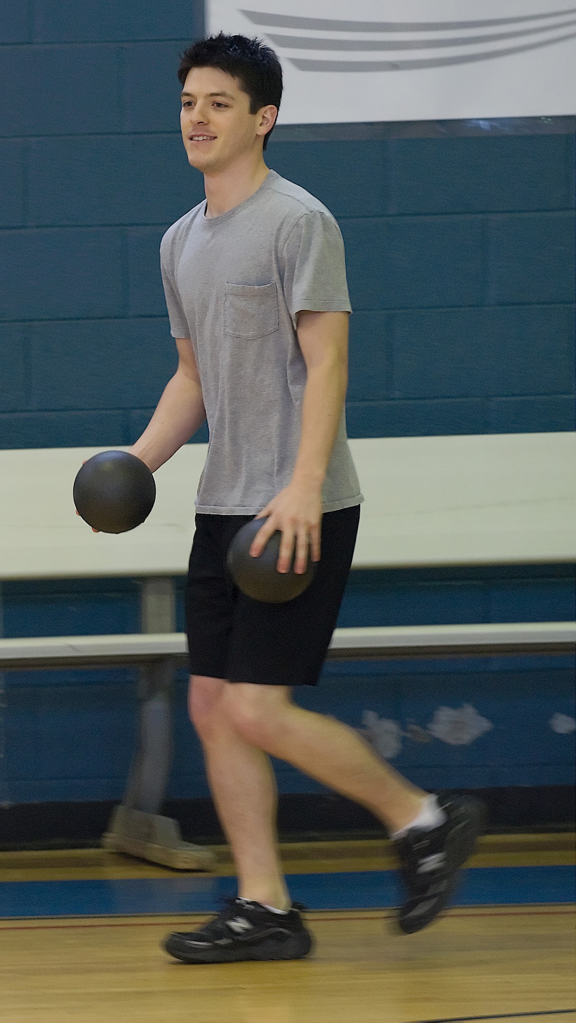 Christian Lantry, 436th Force Support Squadron, participates during the Dodgeball Tournament March 12 at the Fitness Center. The 436th Operations Support Squadron garnished the title as Dodgeball Tournament Champions. (U.S. Air Force photo/Brianne Zimny)