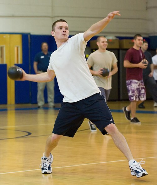 Airman 1st Class Michael White, 436th Maintenance Squadron, attempts to throw the ball during the Dodgeball Tournament March 12 at the Fitness Center. (U.S. Air Force photo/Jason Minto) 