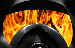 LANGLEY AIR FORCE BASE, Va. – 633d Civil Engineer Squadron Fire Department firefighters approach dangerous situations that most people would flee from.  (U.S. Air Force photo illustration/Staff Sgt. Barry Loo)