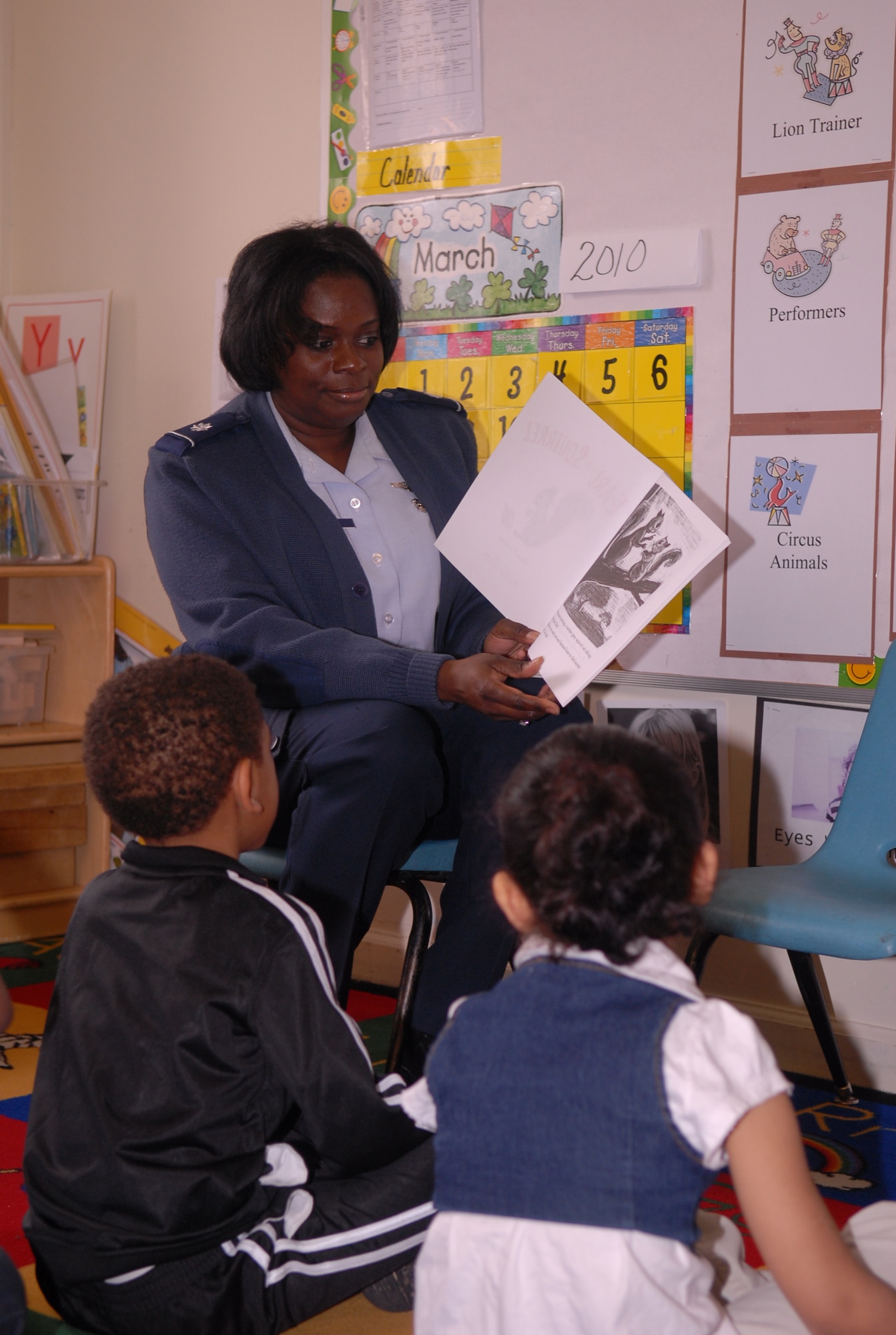 Lt. Col. Terri Bailey, 43rd Medical Operations Squadron, Commander reads children's books to students in a Head Start classroom in Fayetteville March 11. (U.S. Air Force Photo/ 2nd Lt. Cammie Quinn