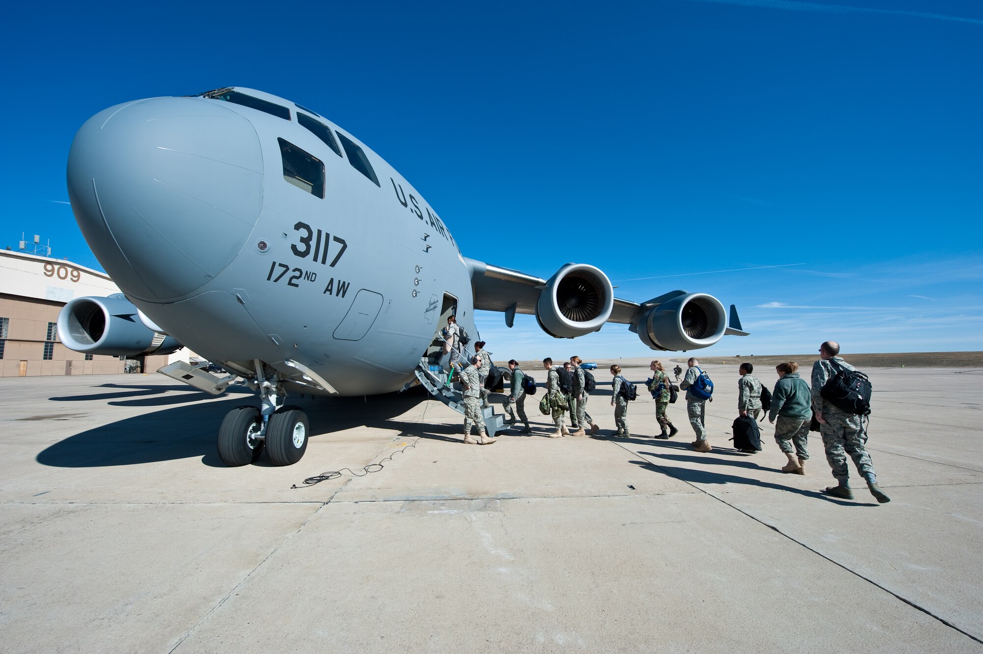 More than 60 Airmen from the 140th Medical Group board a C-17 Globemaster aircraft March 13, 2010, to Honolulu from Buckley Air Force Base, Colorado to provide services to the medically underserved communities within the State of Hawaii. (U.S. Air Force photo/Master Sgt. John Nimmo, Sr.) (RELEASED)