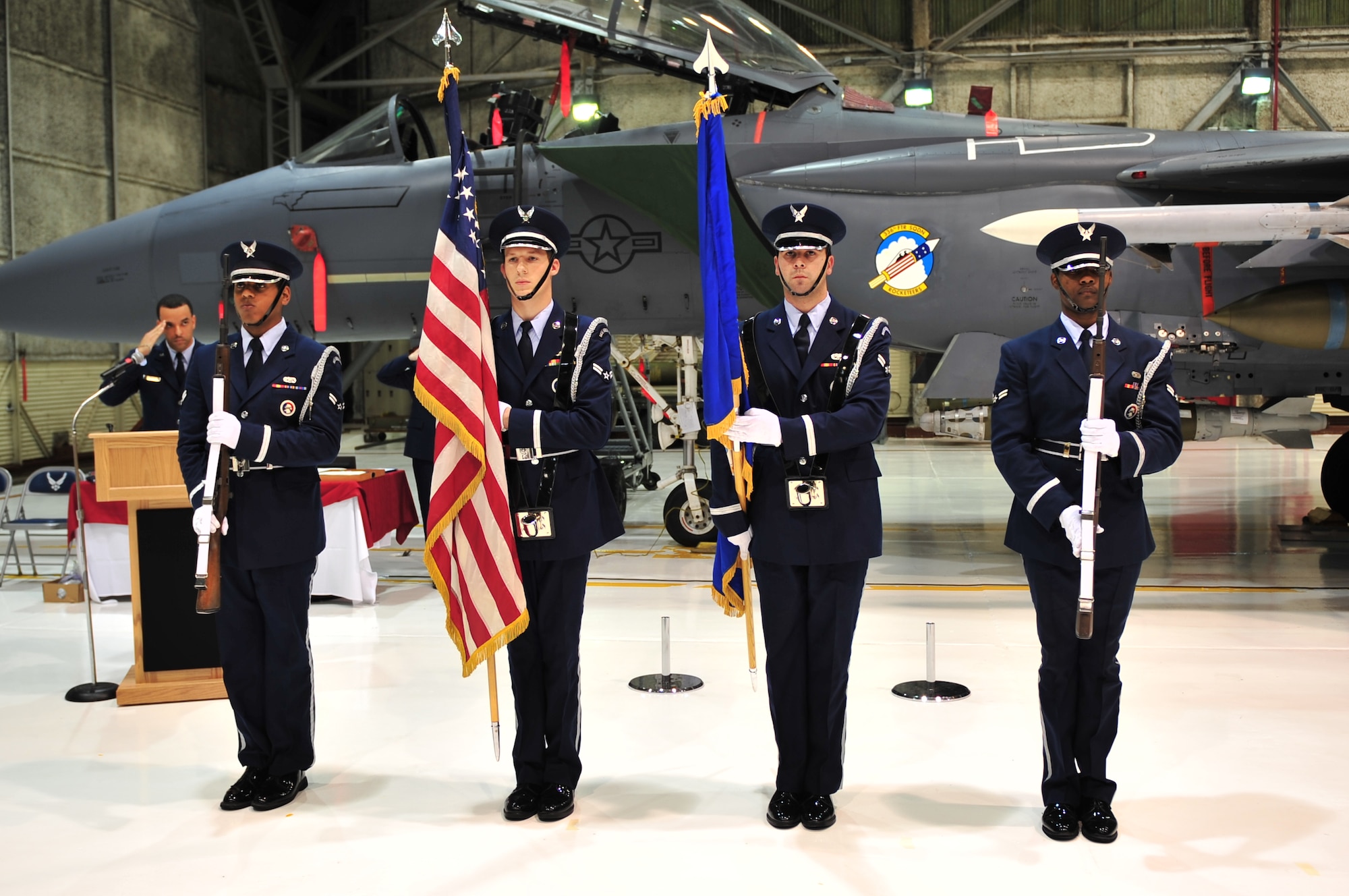 Airmen from the 4th Fighter Wing Honor Guard present “The Colors” during a retirement ceremony for Senior Master Sgt. Arthur Griffenkranz Jr., formerly from the 4th Operations Support Squadron, on Seymour Johnson Air Force Base, N.C., Feb. 5, 2010. Honor Guard Airmen serve as the face of their base representing the Air Force community and its traditions to servicemembers, their families and civilians alike during times of joy and sorrow. (U.S. Air Force photo/Senior Airman Rae Perry