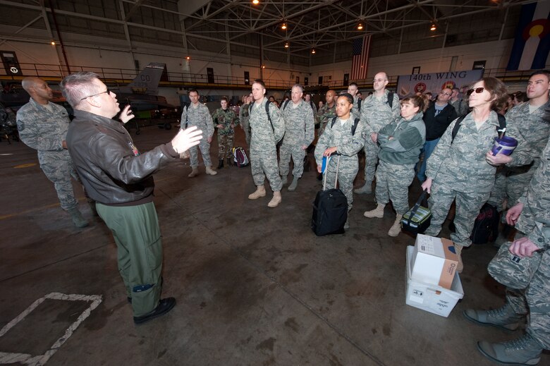 U.S. Air Force Lt. Col. Paul Shingledecker, Commander, 140th Medical Group, Colorado Air National Guard, speaks with members of his team about C-17 boarding and seating procedures, March 13, 2010. The 140th Medical Group is conducting training in Honolulu as part of Hawaii’s Medical Innovative Readiness Training (HIMIRT) domestic civil-military training program E Malama Kakou (translated from Hawaiian as “to care for all”). (U.S. Air Force photo/Master Sgt. John Nimmo, Sr.) (RELEASED)