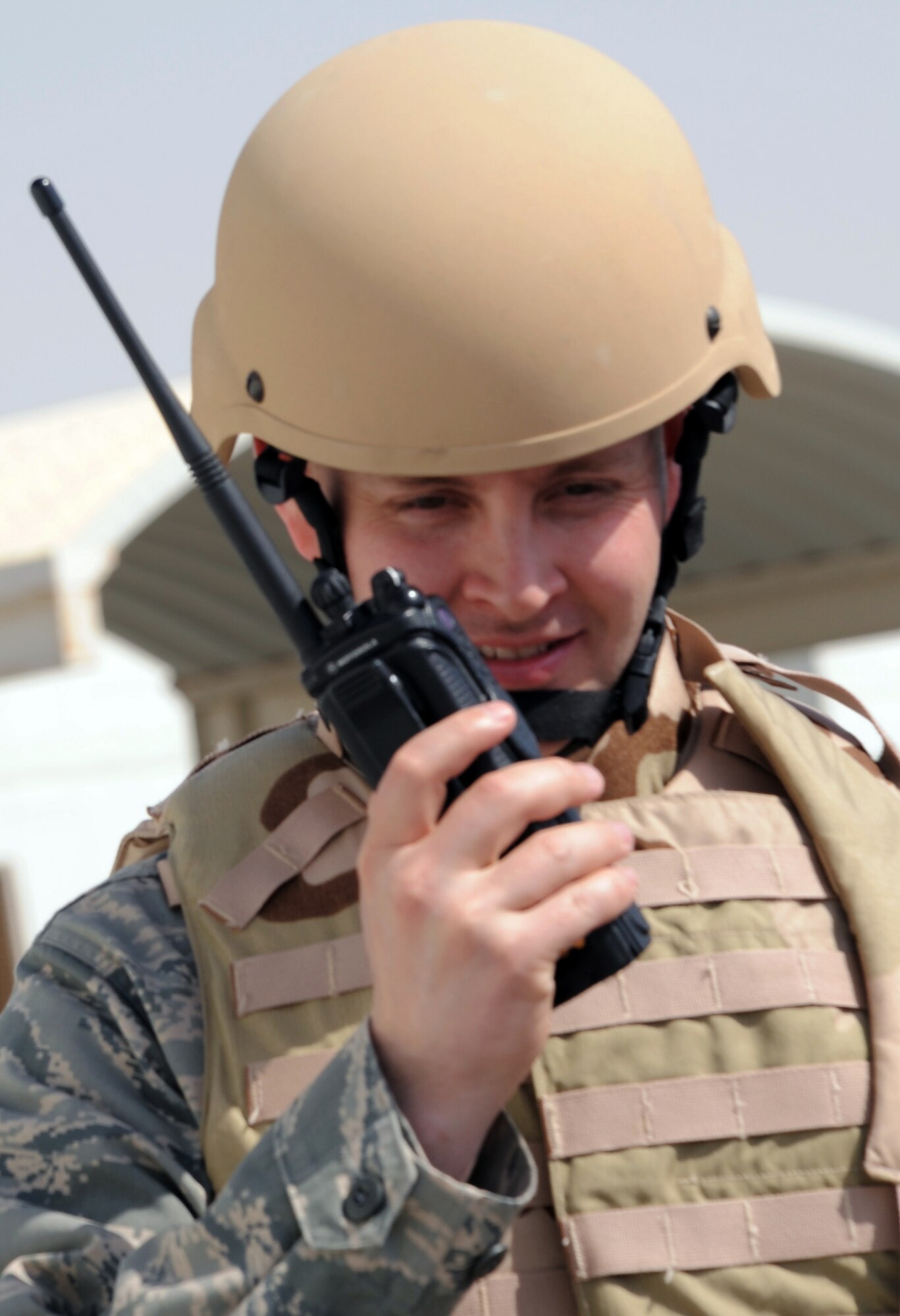 Capt. Matthew Nix, operations officer for the 380th Expeditionary Security Forces Squadron, talks over his radio during a security forces exercise at a non-disclosed base in Southwest Asia on Feb. 20, 2010. In his job, he leads, manages and directs security forces Airmen providing security and force protection for the 380th Air Expeditionary Wing?s people and billions of dollars worth of deployed assets, equipment and aircraft. His hometown is Fort Collins, Colo. (U.S. Air Force Photo/Master Sgt. Scott T. Sturkol/Released)
