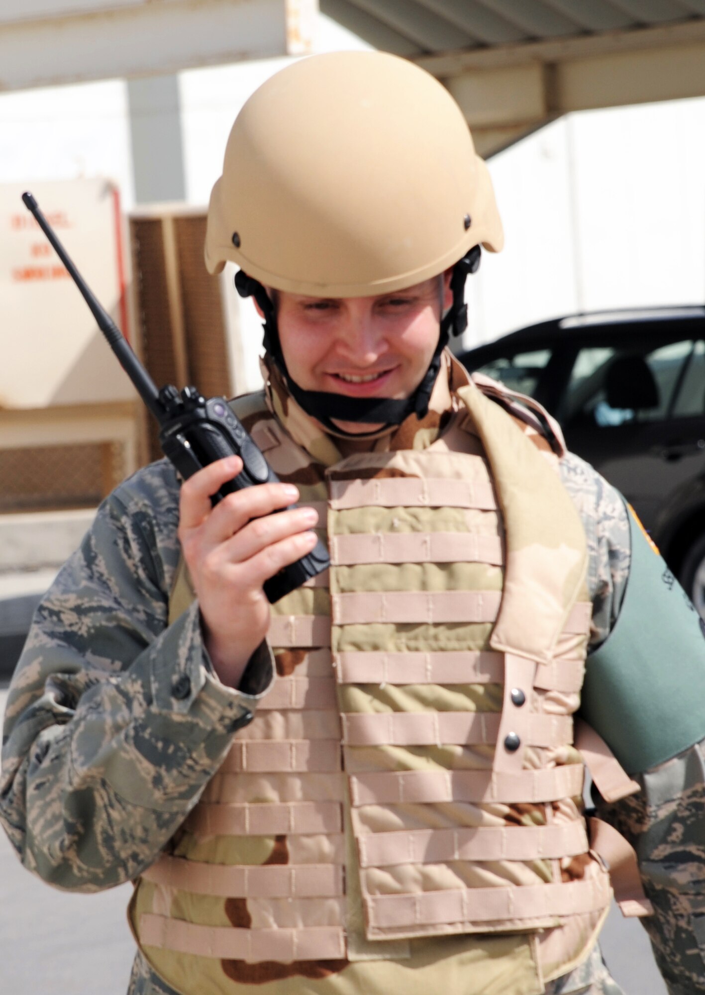 Capt. Matthew Nix, operations officer for the 380th Expeditionary Security Forces Squadron, talks over his radio during a security forces exercise at a non-disclosed base in Southwest Asia on Feb. 20, 2010. In his job, he leads, manages and directs security forces Airmen providing security and force protection for the 380th Air Expeditionary Wing?s people and billions of dollars worth of deployed assets, equipment and aircraft. His hometown is Fort Collins, Colo. (U.S. Air Force Photo/Master Sgt. Scott T. Sturkol/Released)