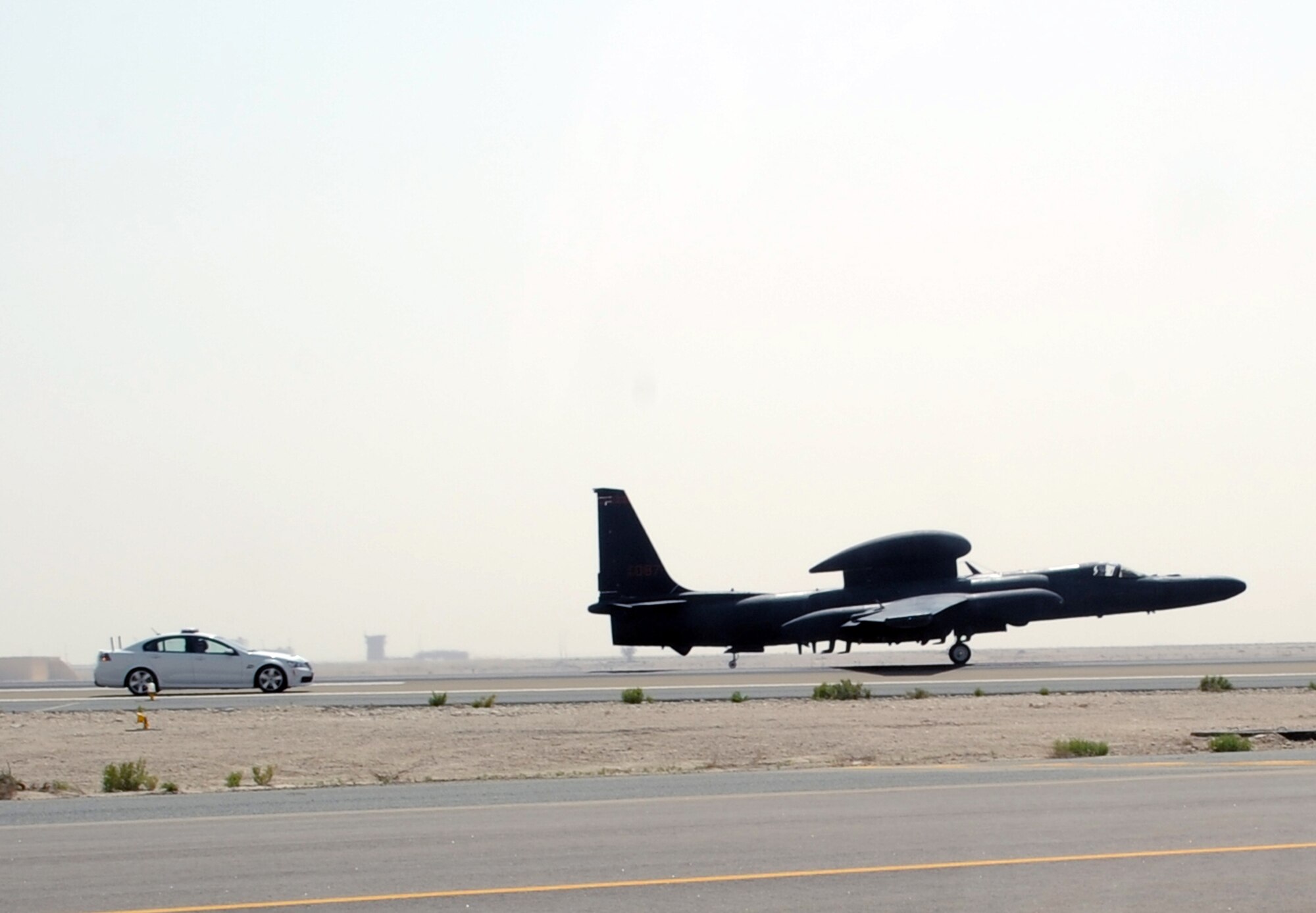 Maj. William Gottenberg, U-2 pilot with the 99th Expeditionary Reconnaissance Squadron, brings a U-2 Dragon Lady in for a landing after completing his 100th combat mission in the U-2 from a non-disclosed base in Southwest Asia on March 9, 2010. Major Gottenberg is deployed from Beale Air Force Base, Calif., and his hometown is Rocklin, Calif. (U.S. Air Force Photo/Master Sgt. Scott T. Sturkol/Released)
