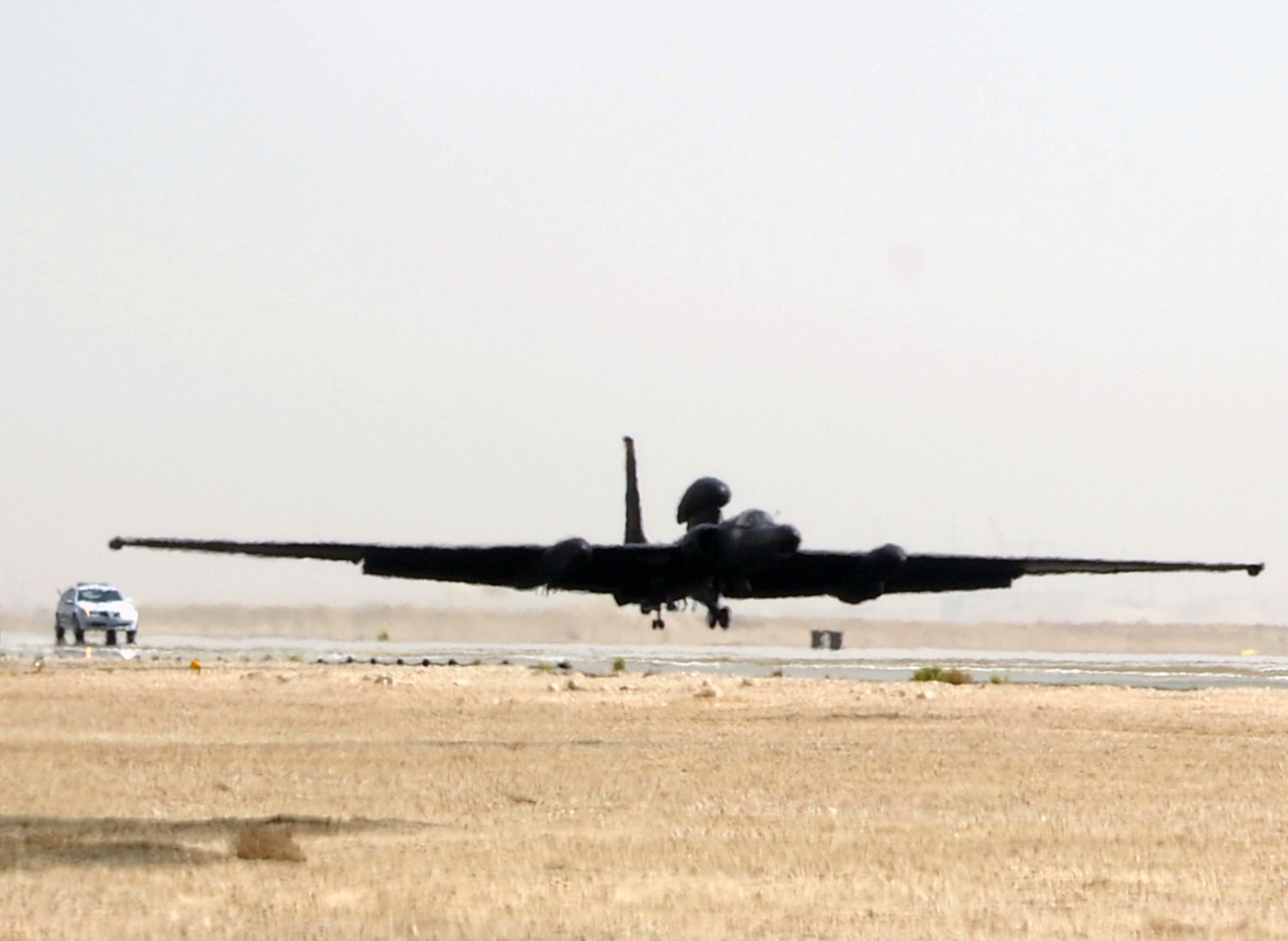 Maj. William Gottenberg, U-2 pilot with the 99th Expeditionary Reconnaissance Squadron, brings a U-2 Dragon Lady in for a landing after completing his 100th combat mission in the U-2 from a non-disclosed base in Southwest Asia on March 9, 2010. Major Gottenberg is deployed from Beale Air Force Base, Calif., and his hometown is Rocklin, Calif. (U.S. Air Force Photo/Master Sgt. Scott T. Sturkol/Released)