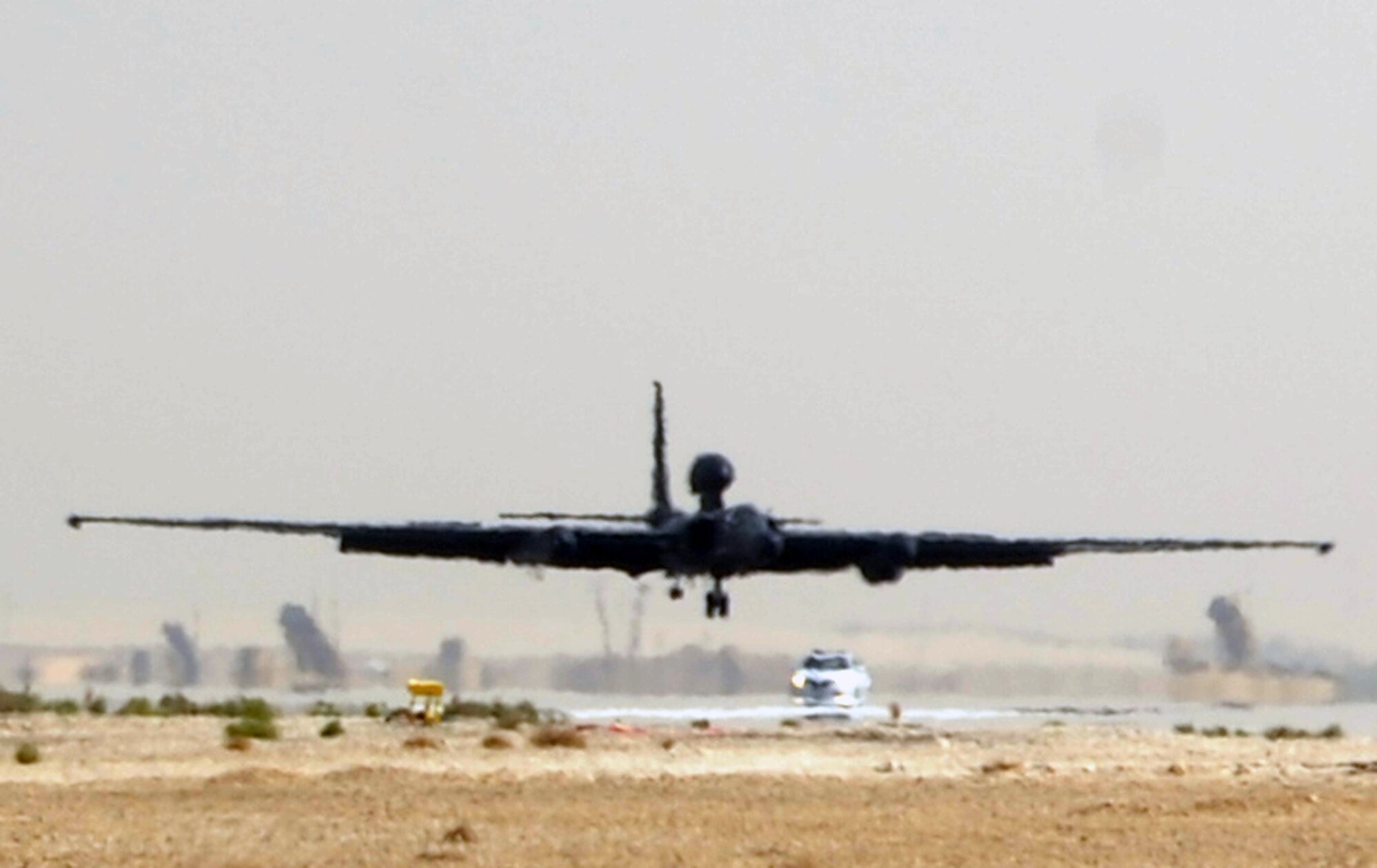 Maj. William Gottenberg, U-2 pilot with the 99th Expeditionary Reconnaissance Squadron, brings a U-2 Dragon Lady in for a landing after completing his 100th combat mission in the U-2 from a non-disclosed base in Southwest Asia on March 9, 2010. Major Gottenberg is deployed from Beale Air Force Base, Calif., and his hometown is Rocklin, Calif. (U.S. Air Force Photo/Master Sgt. Scott T. Sturkol/Released)