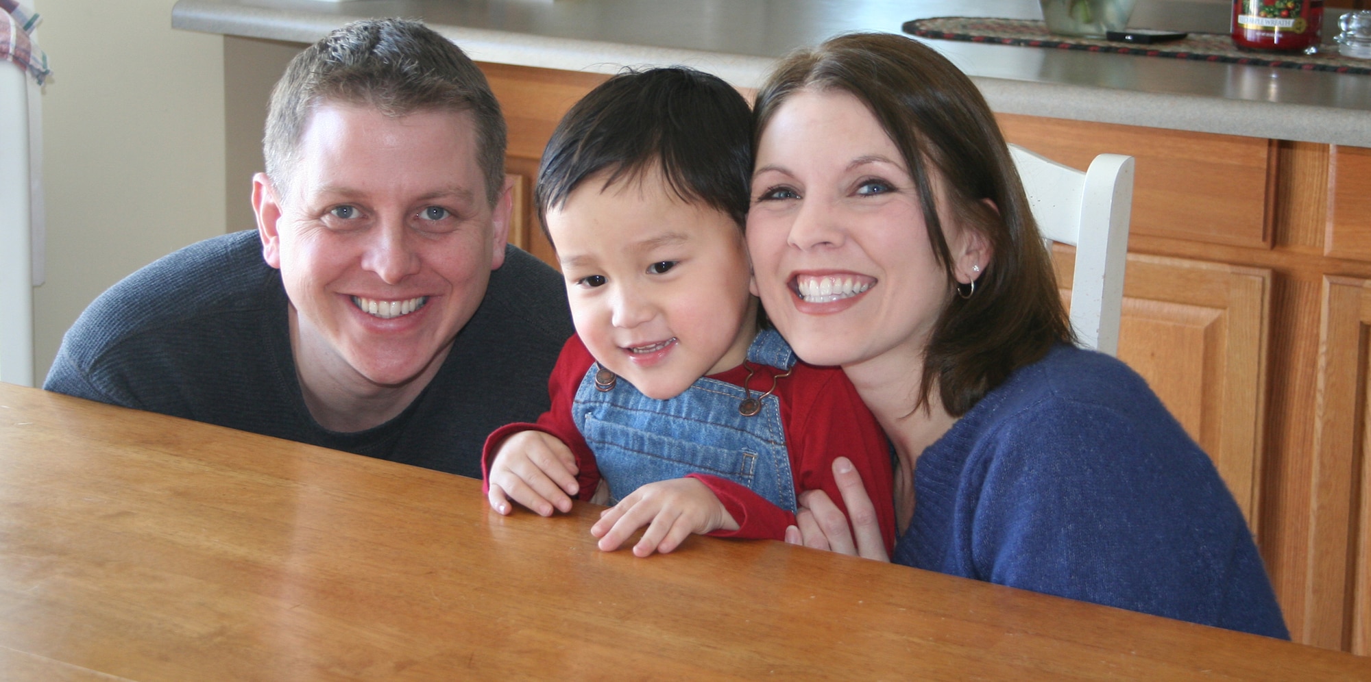 WRIGHT-PATTERSON AIR FORCE BASE, Ohio – Capt. Scott and Kami DeBoer and their son, Kaleb,  wait for news at their home in Fairborn, Ohio, on when they can bring Tate, the child they are waiting to adopt, home from Kyrgyzstan. The DeBoer’s saga is one of approximately 65 cases in which families in the U.S. and Canada had in-process adoptions put on hold by the Kyrgyz government as the adoption process is reviewed. (U.S. Air Force photo/Stacy Vaughn)