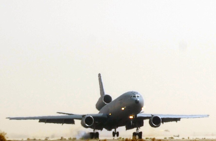 A flight crew guides a KC-10 Extender from the 908th Expeditionary Air Refueling Squadron to a landing at a non-disclosed base in Southwest Asia on March 9, 2010. The 908th EARS, as part of the 380th Air Expeditionary Wing, supports operations Iraqi Freedom and Enduring Freedom and the Combined Joint Task Force-Horn of Africa. (U.S. Air Force Photo/Master Sgt. Scott T. Sturkol/Released)