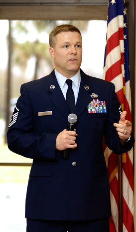 Master Sgt. Timothy Smith speaks to an audience at the Charleston Metro Chamber of Commerce March 11. The conference was one of many held to help raise funds within the community to support programs such as workforce development, workforce housing and the military policy council. Sergeant Smith recently returned from a deployment to the Middle East and spoke about the community support that was organized by the chamber to boost the morale of deployed troops. Sergeant Smith is the 437th Logistics Readiness Squadron first sergeant. (U.S. Air Force photo/Airman 1st Class Lauren Main)